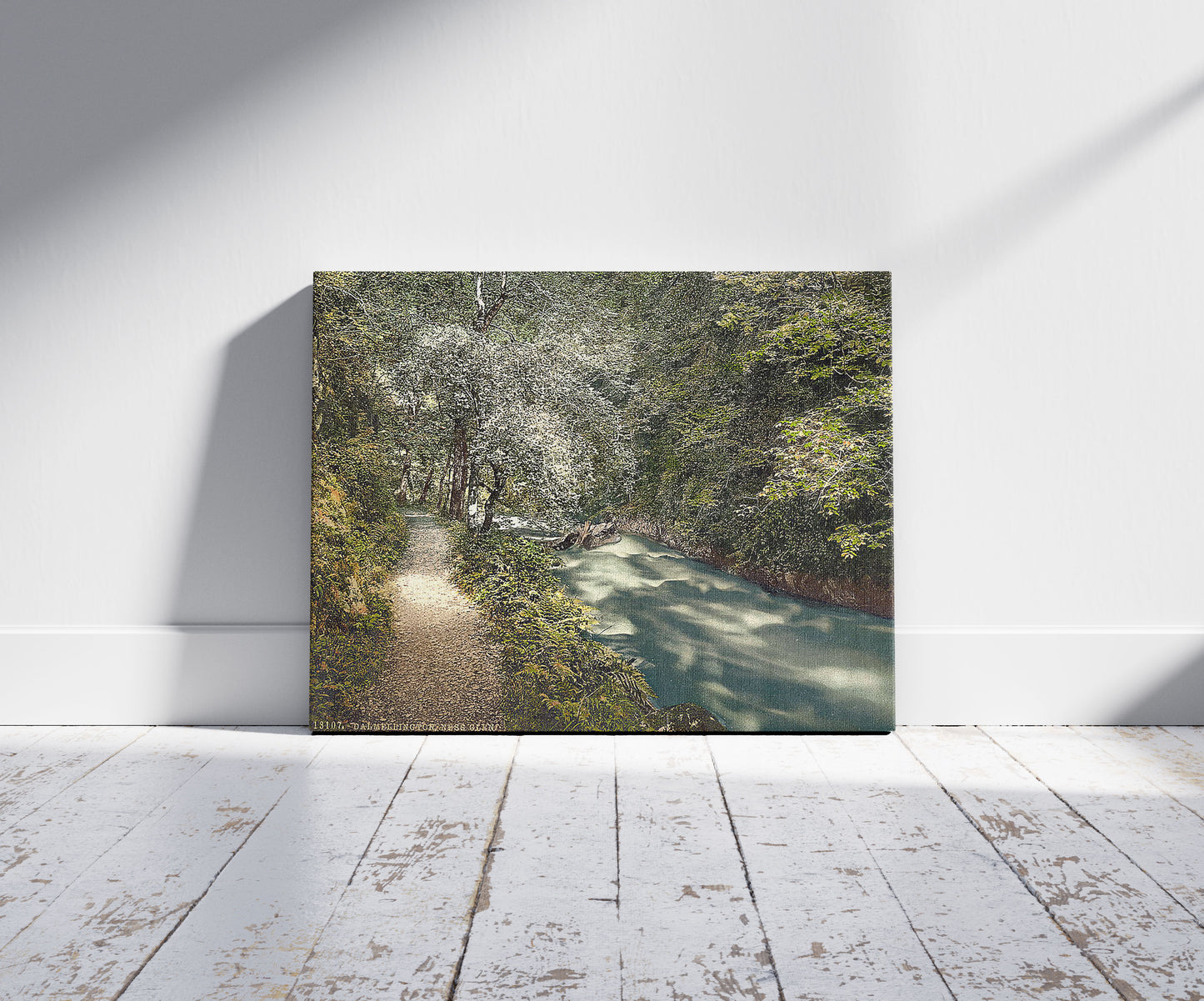 A picture of Ness Glen, Dalmellington, Scotland, a mockup of the print leaning against a wall