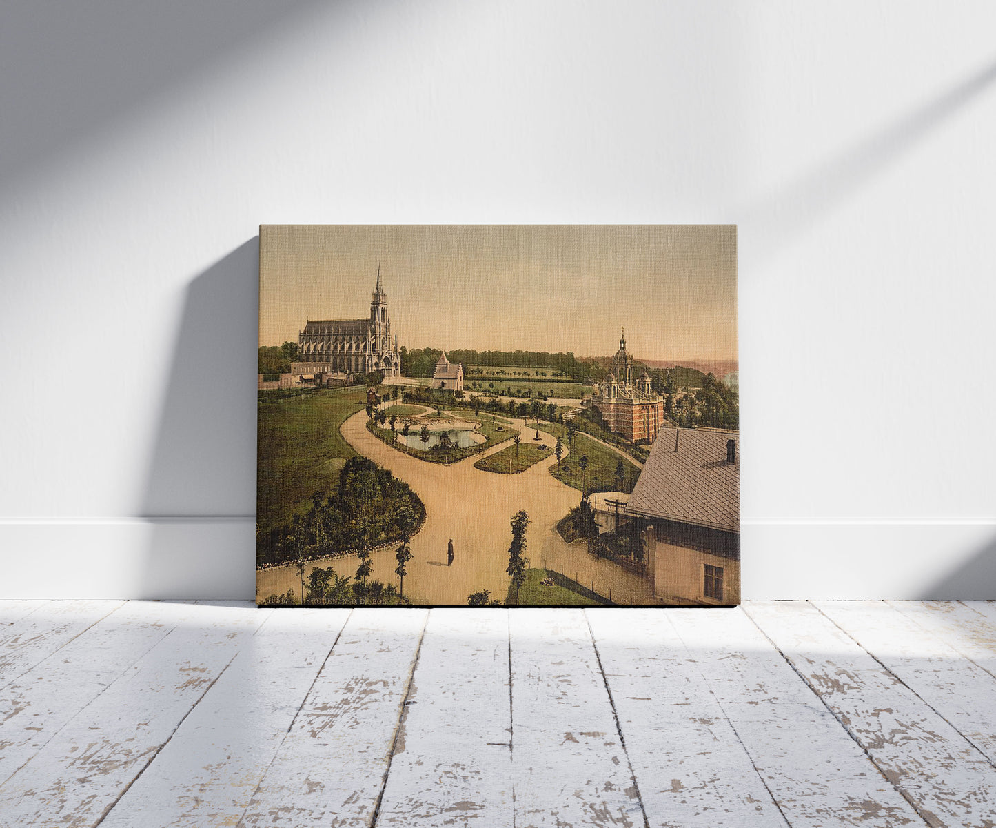 A picture of Notre Dame de Bon Secours and Joan of Arc's monument, Rouen, France, a mockup of the print leaning against a wall