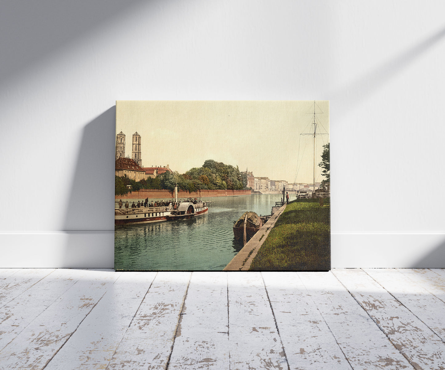 A picture of Oder River, with Cathedral Island, Breslau, Silesia, Germany (i.e., Wrocław, Poland), a mockup of the print leaning against a wall