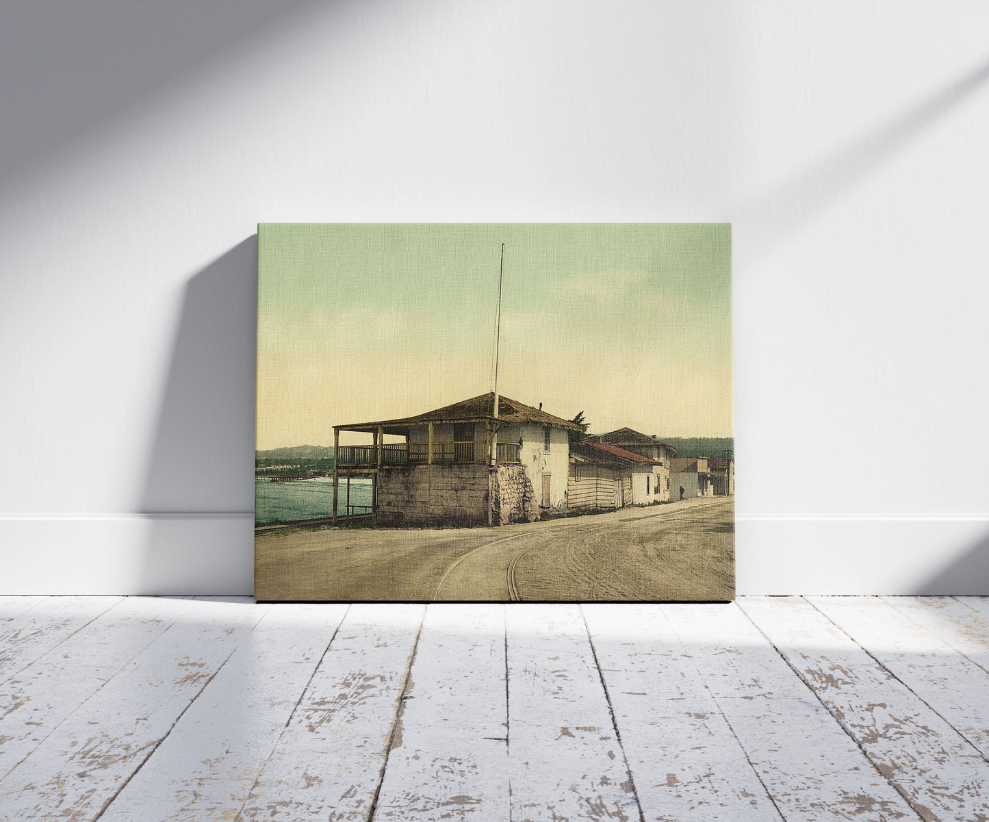A picture of Old Custom House, Monterey, Cal., a mockup of the print leaning against a wall