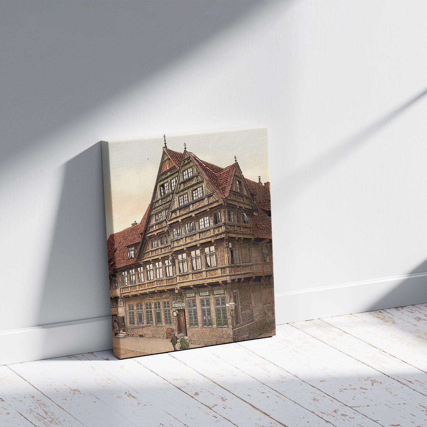A picture of Old house, Hildesheim, Hanover, Germany, a mockup of the print leaning against a wall