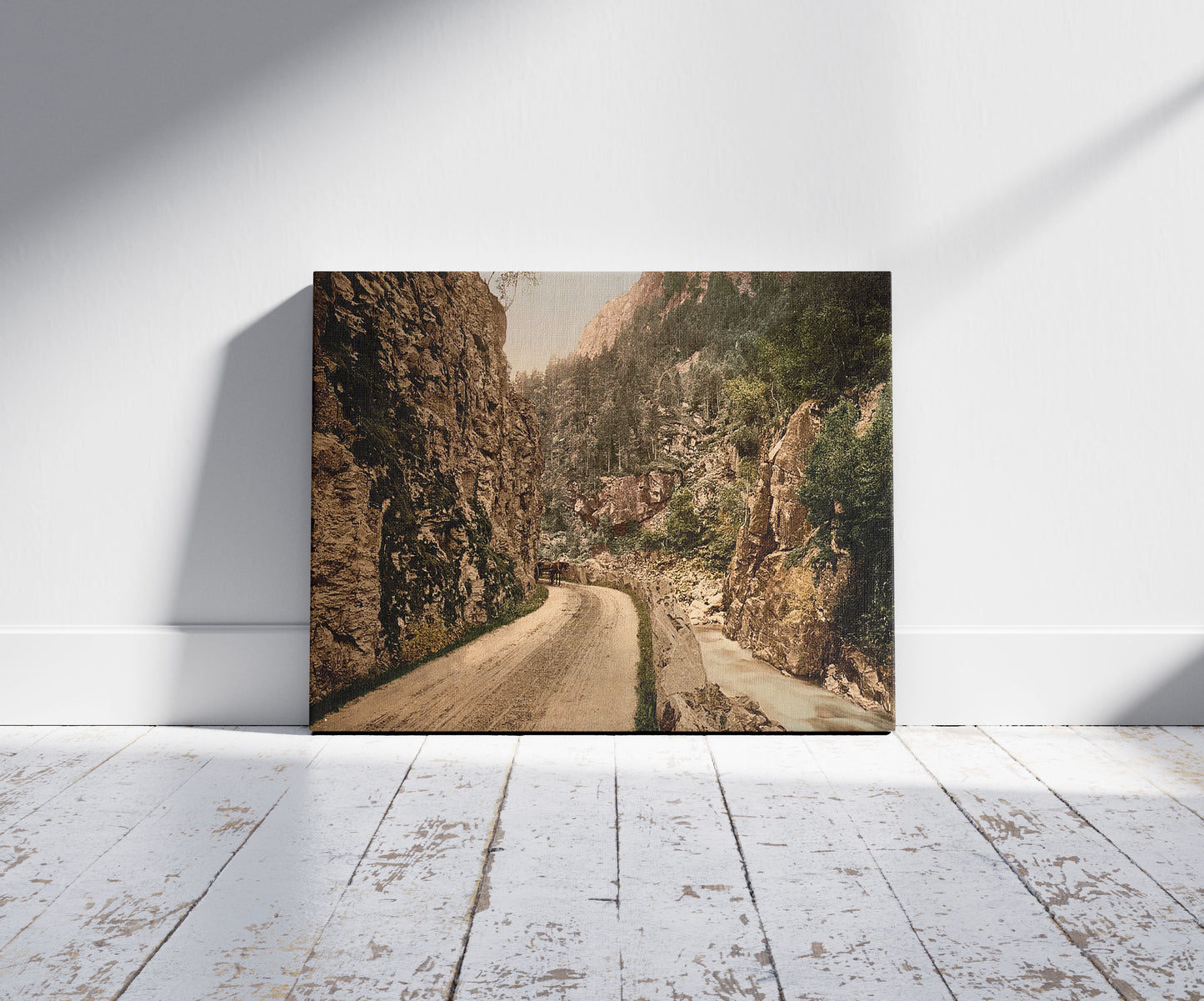 A picture of On the road between Voss & Stalheim Norway, a mockup of the print leaning against a wall