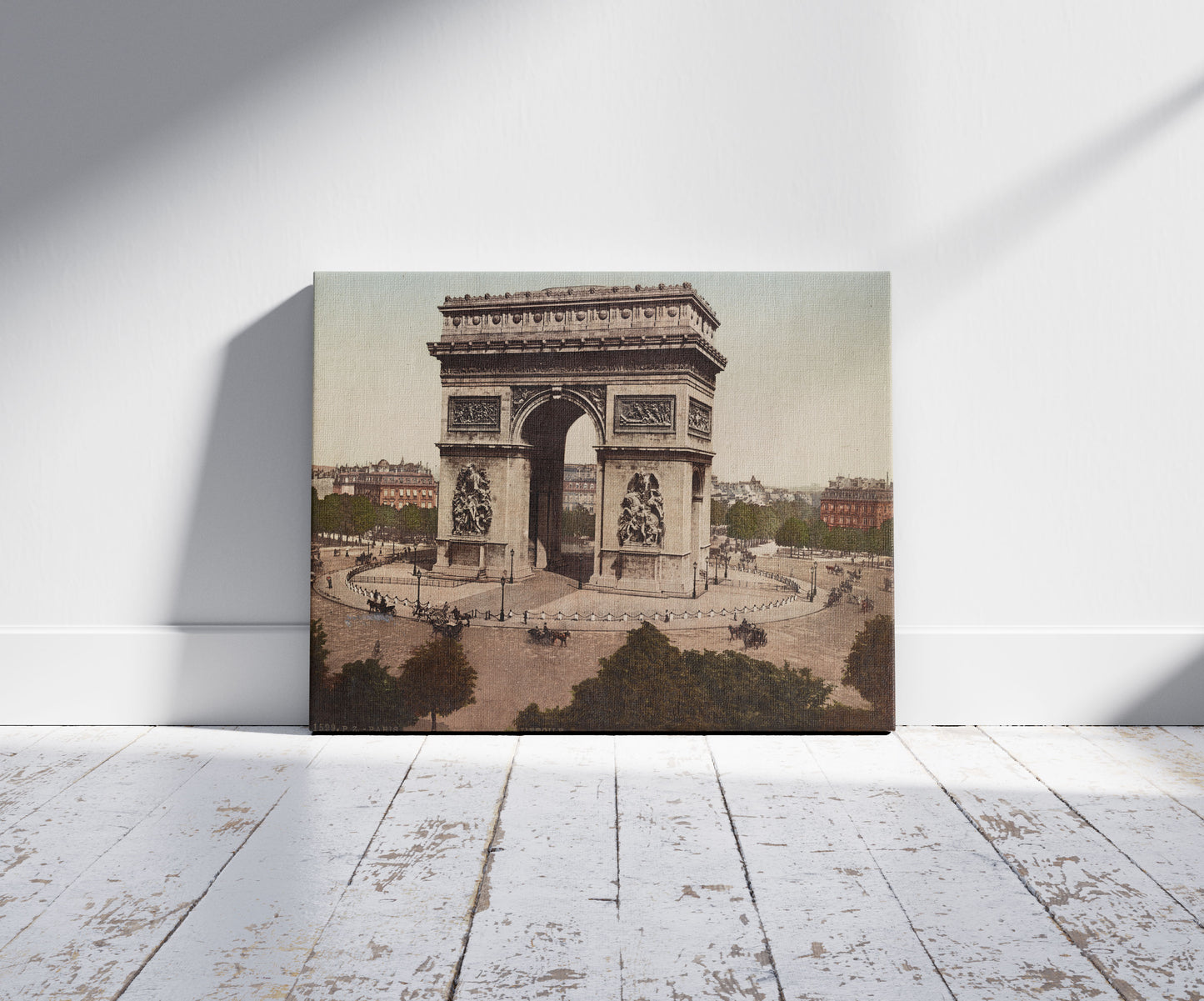 A picture of Paris. L'Arc-de-Triomphe de L'Etoile, a mockup of the print leaning against a wall