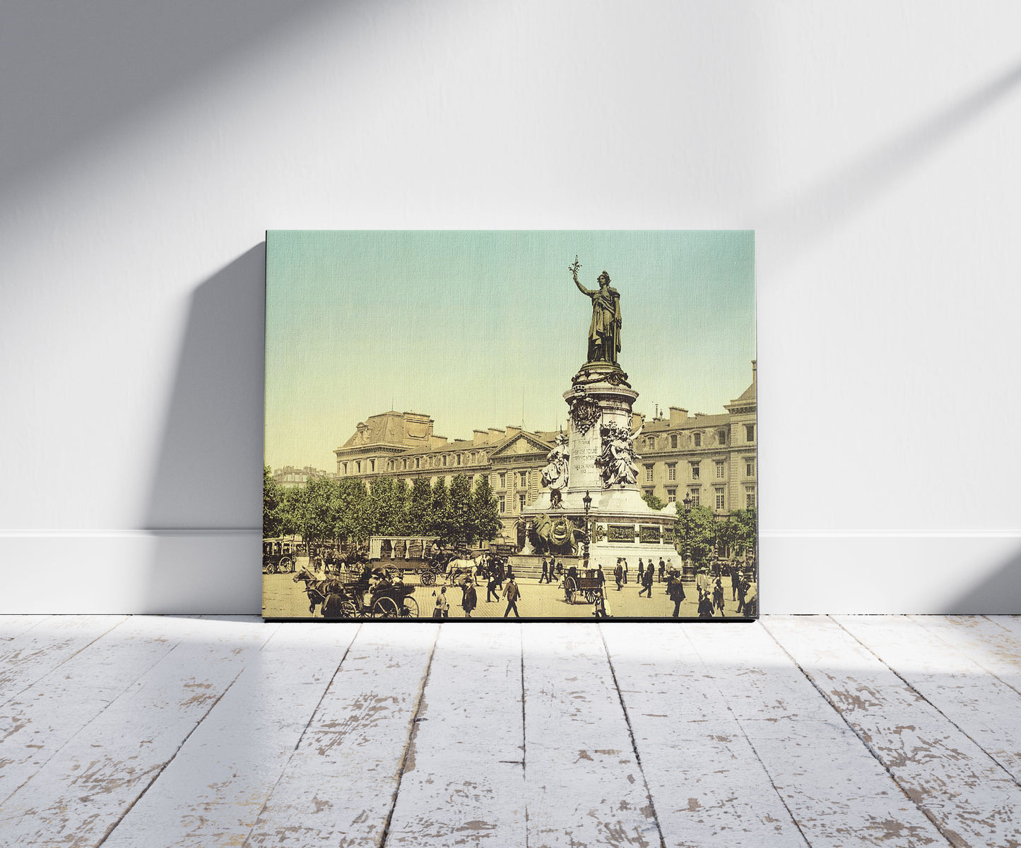 A picture of Place de la Republique, Paris, France, a mockup of the print leaning against a wall