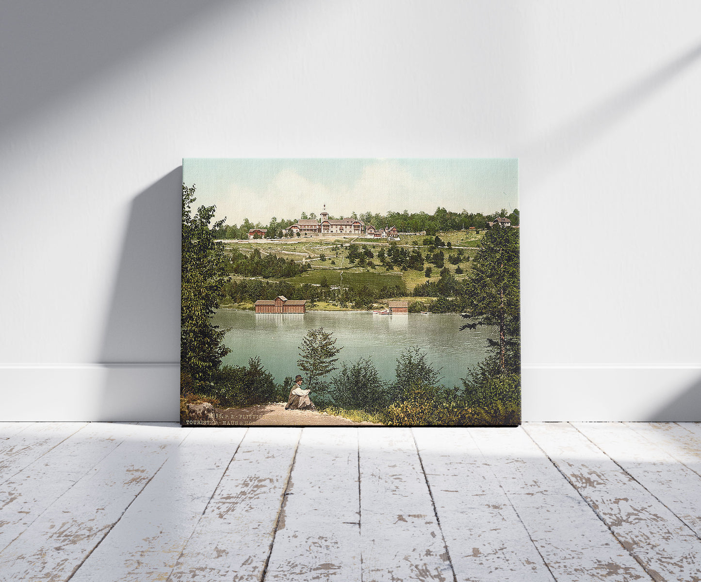 A picture of Pletvicerseen (i.e., Plitvice Lakes), tourist's rest and hotel at Kozjaksee, Croatia, Austro-Hungary, a mockup of the print leaning against a wall