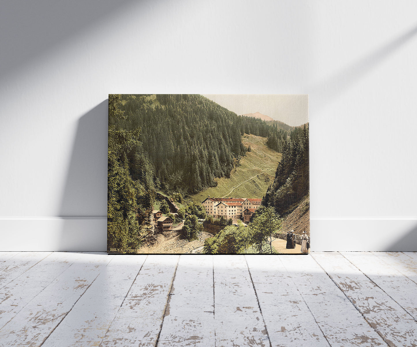 A picture of Pratigau, the Baths of Fideris, Grisons, Switzerland, a mockup of the print leaning against a wall