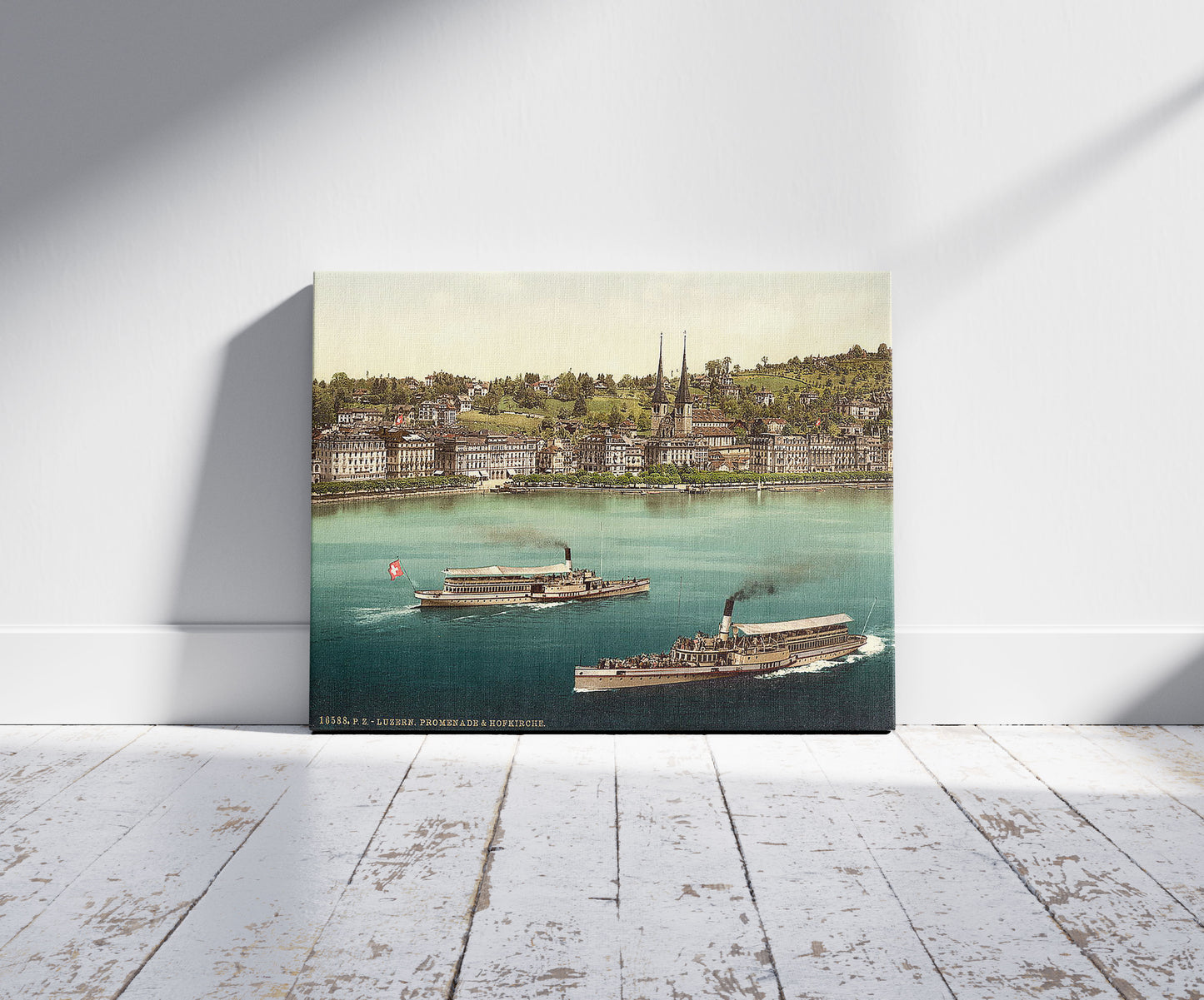 A picture of Promenade and cathedral, with two small steamers, Lucerne, Switzerland
