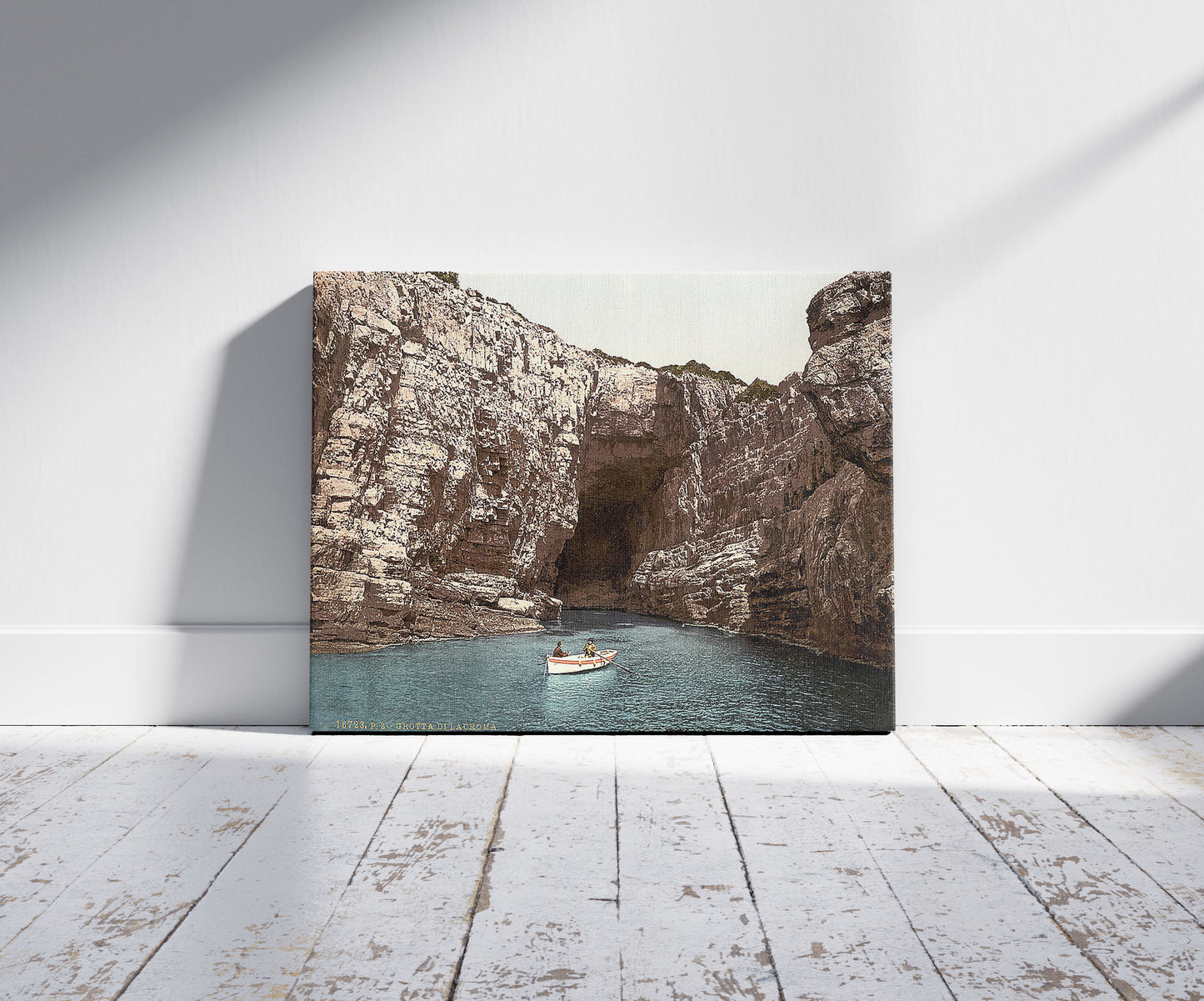 A picture of Ragusa, Cave of Lacroma, Dalmatia, Austro-Hungary, a mockup of the print leaning against a wall