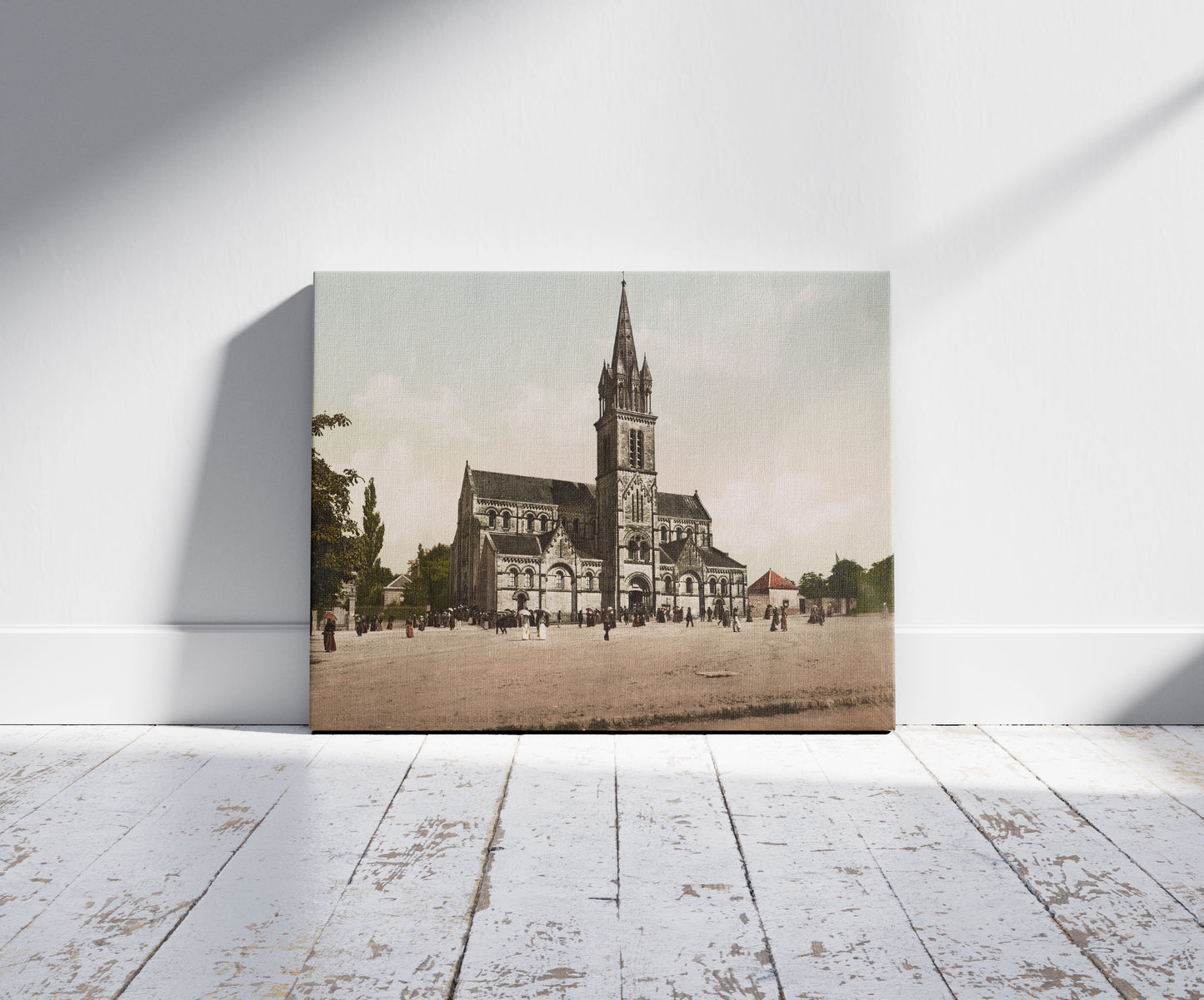 A picture of Saint-Lô. Place et Eglise Sainte-Croix, a mockup of the print leaning against a wall