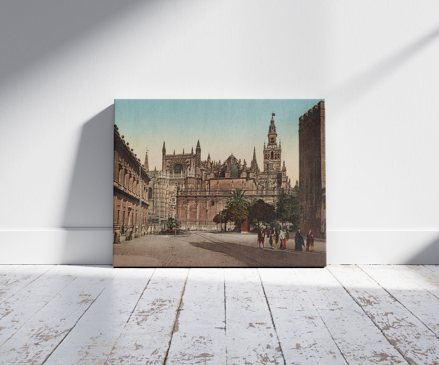 A picture of Sevilla. Plaza del Triunfo con la Catedral, a mockup of the print leaning against a wall