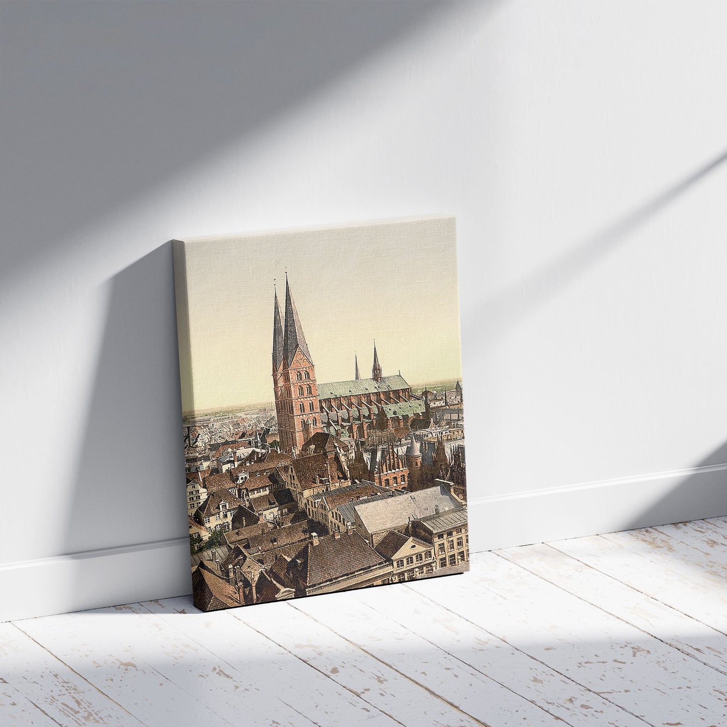 A picture of St. Mary's, from St. Peter's Clock Tower, Lubeck, Germany, a mockup of the print leaning against a wall