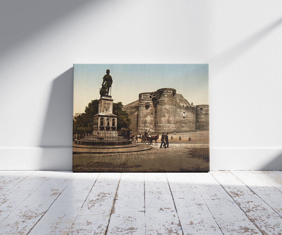 A picture of Statue and castle of King Rene, Angers, France, a mockup of the print leaning against a wall