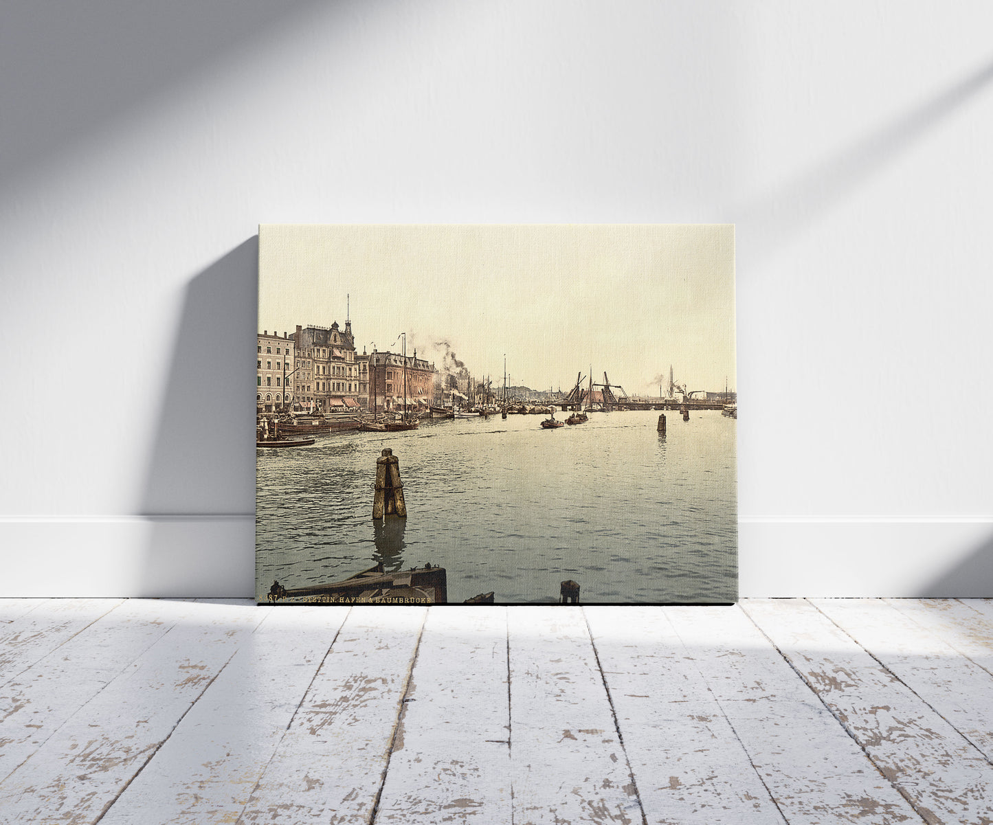 A picture of Stettin Harbor, Pomerania, Germany (i.e., Szczecin, Poland), a mockup of the print leaning against a wall