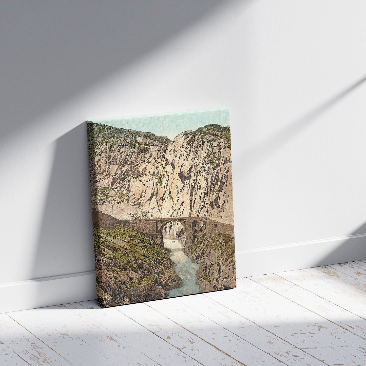 A picture of Teufelsebrücke, Andermatt, Switzerland, a mockup of the print leaning against a wall