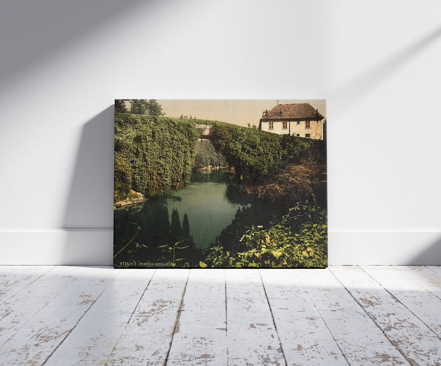 A picture of The bridge, Bétharram, Pyrenees, France, a mockup of the print leaning against a wall