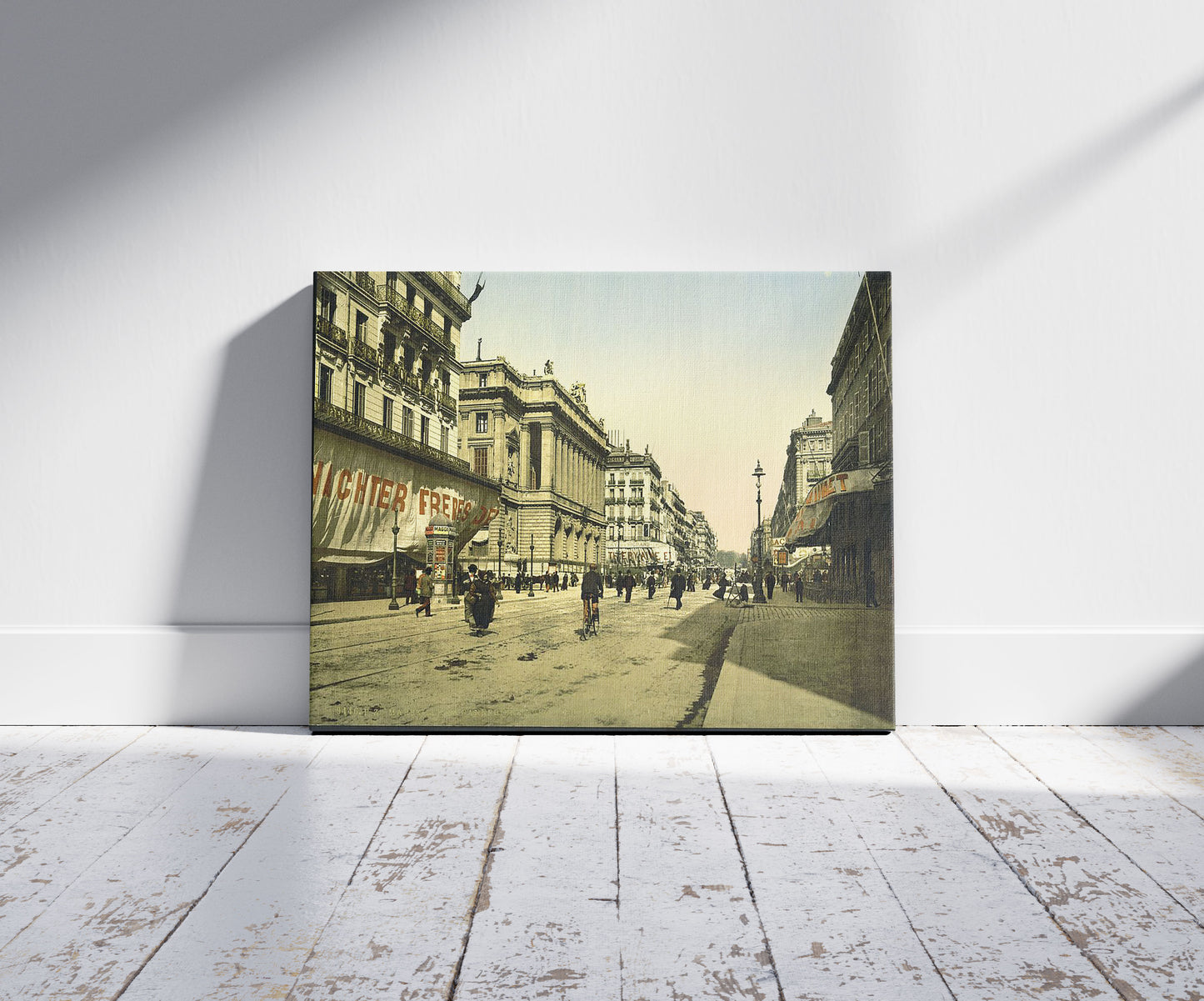 A picture of The Cannabiere (i.e., Cannebière) and the Bourse, Marseilles, France, a mockup of the print leaning against a wall