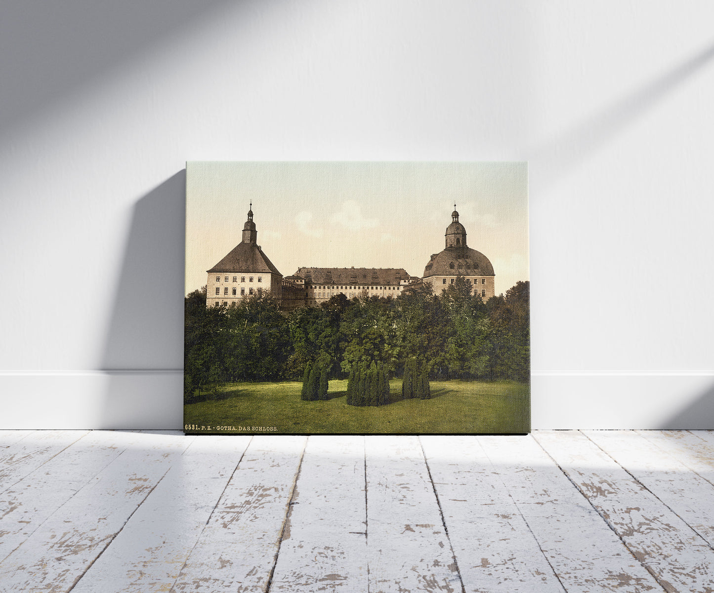 A picture of The castle, Gotha, Thuringia, Germany, a mockup of the print leaning against a wall