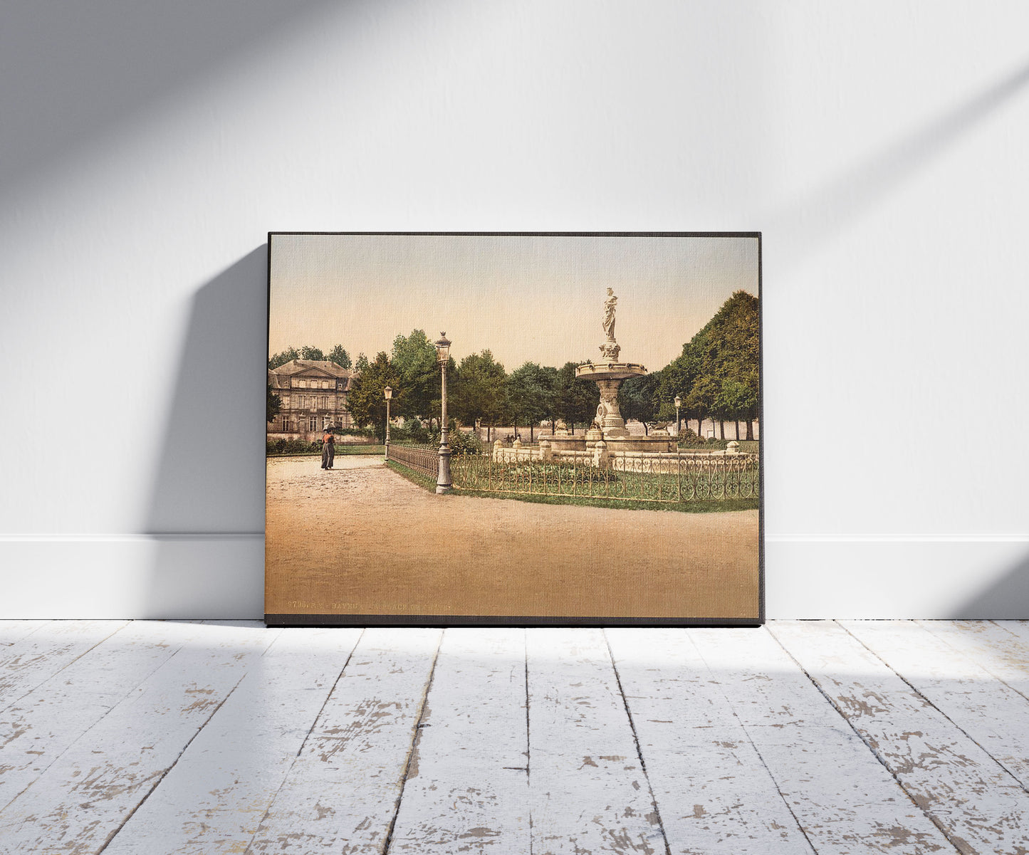 A picture of The castle place, Bayeux, France, a mockup of the print leaning against a wall