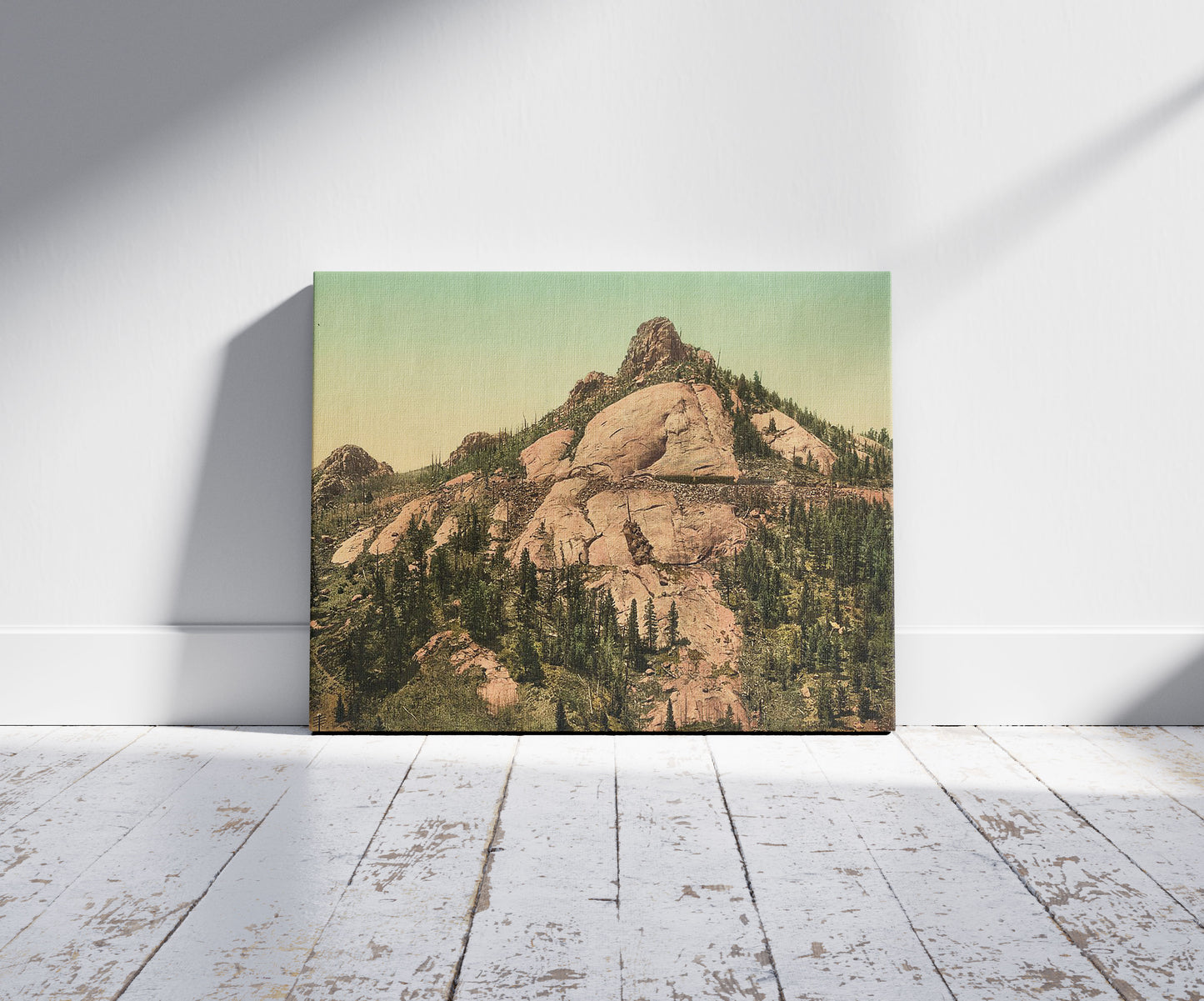 A picture of The Devil's Slide, Colorado, a mockup of the print leaning against a wall