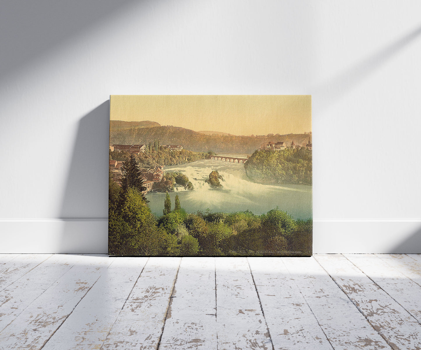 A picture of The Falls of the Rhine, general view, Schaffhausen, Switzerland, a mockup of the print leaning against a wall
