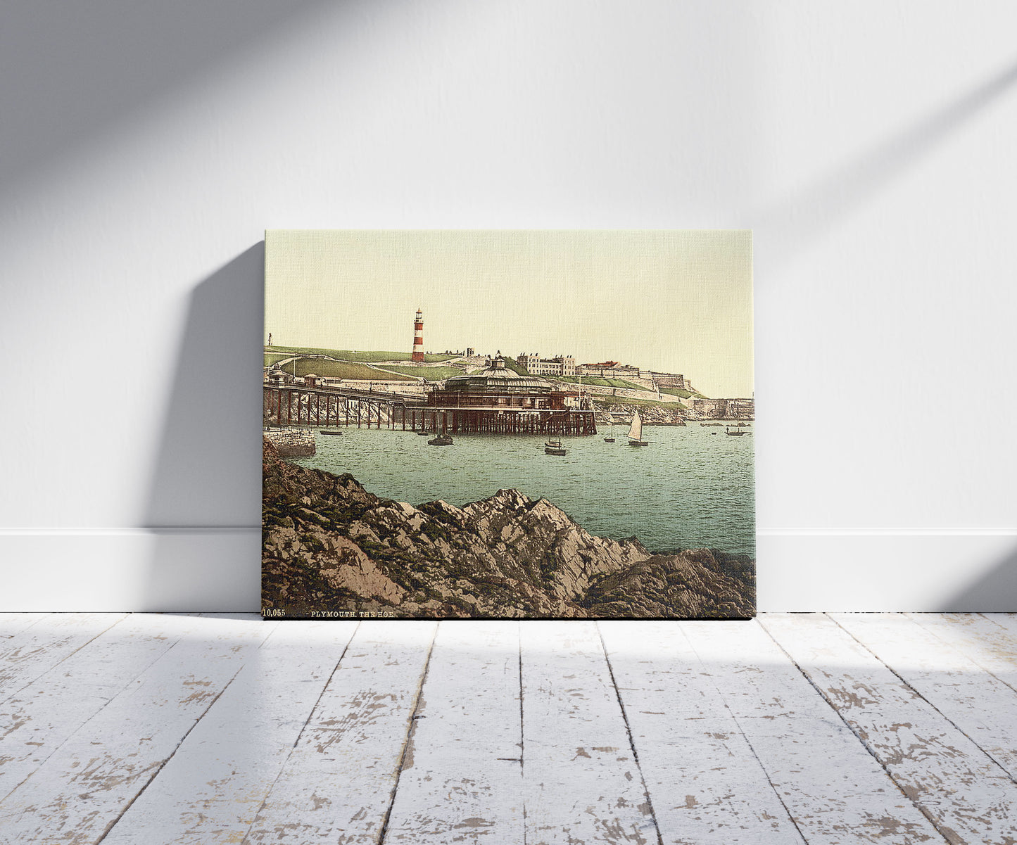 A picture of The Hoe, from the Rusty Anchor, Plymouth, England, a mockup of the print leaning against a wall
