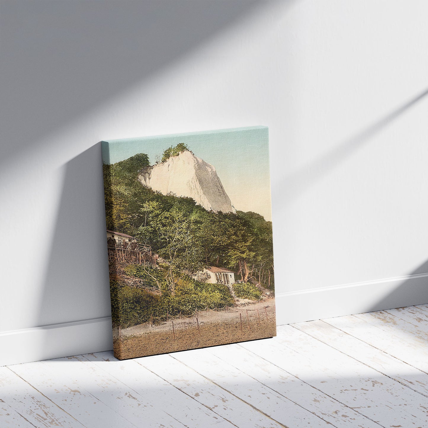 A picture of The Konigsstuhl, with fisher huts, Stubbenkammer, Isle of Rugen, Germany, a mockup of the print leaning against a wall