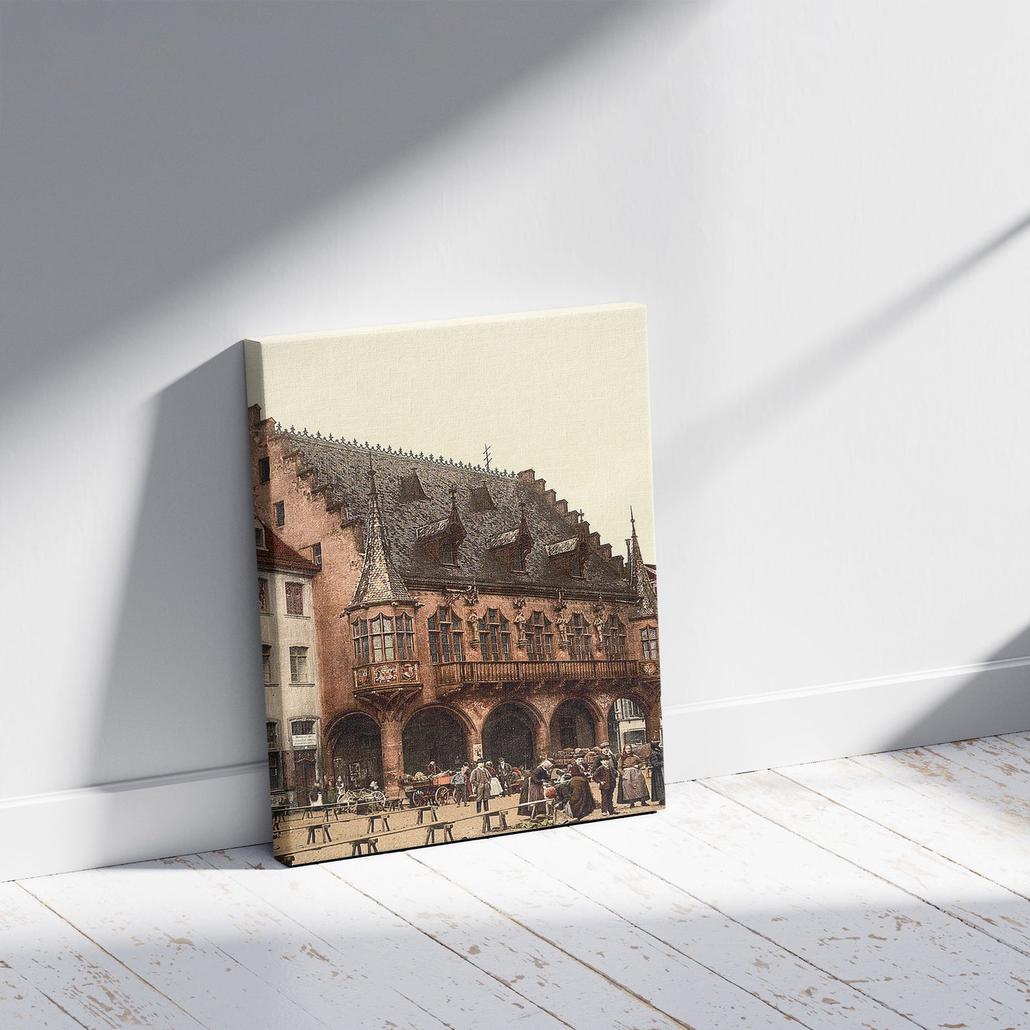 A picture of The Market, Freiburg, Baden, Germany, a mockup of the print leaning against a wall