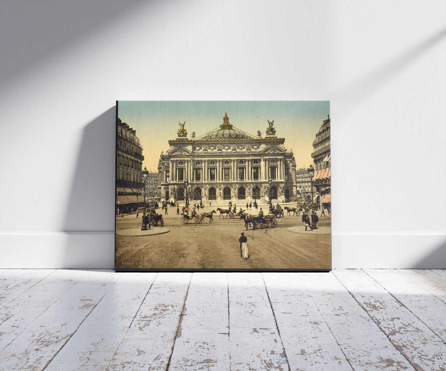 A picture of The Opera House, Paris, France, a mockup of the print leaning against a wall