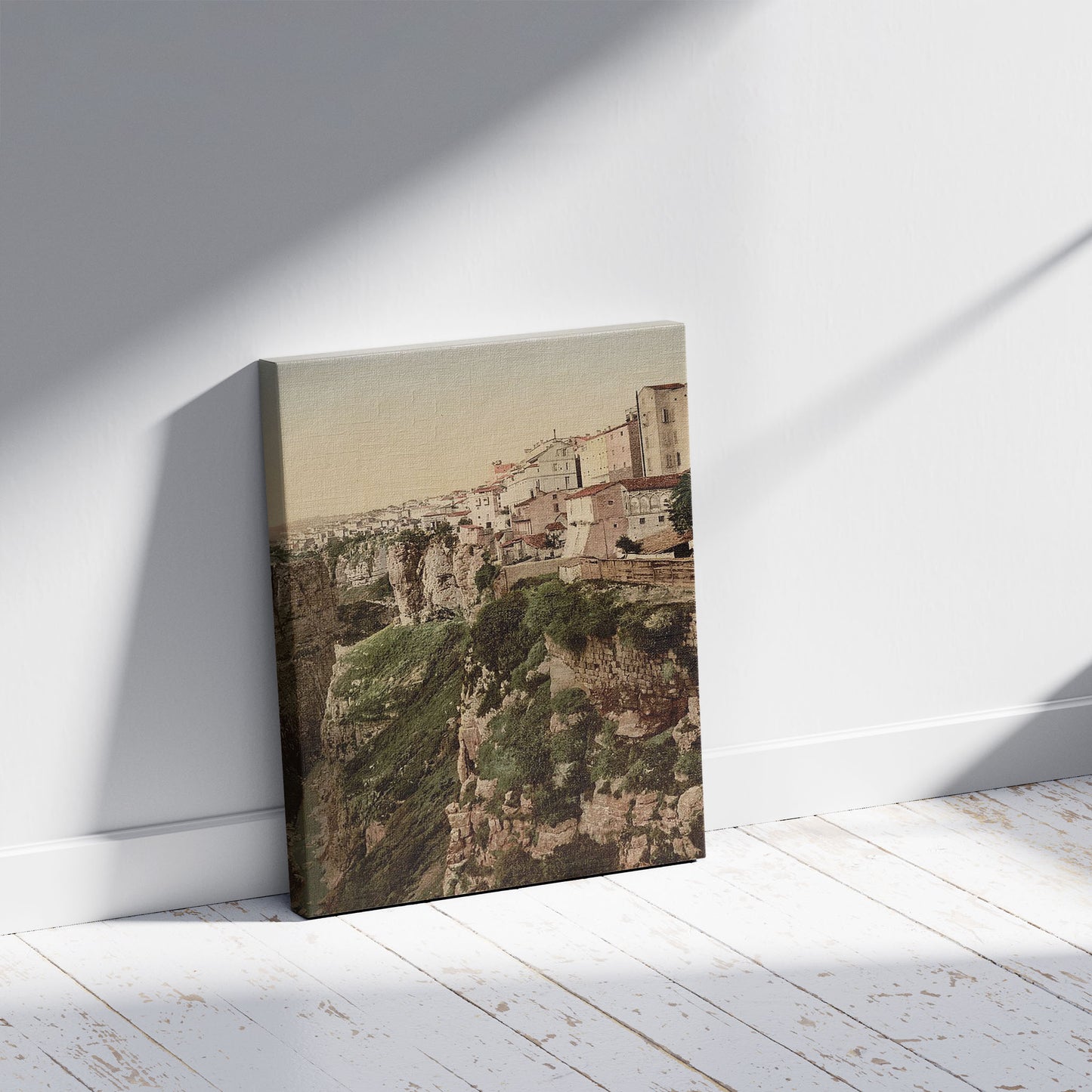 A picture of The ravine, Constantine, Algeria, a mockup of the print leaning against a wall