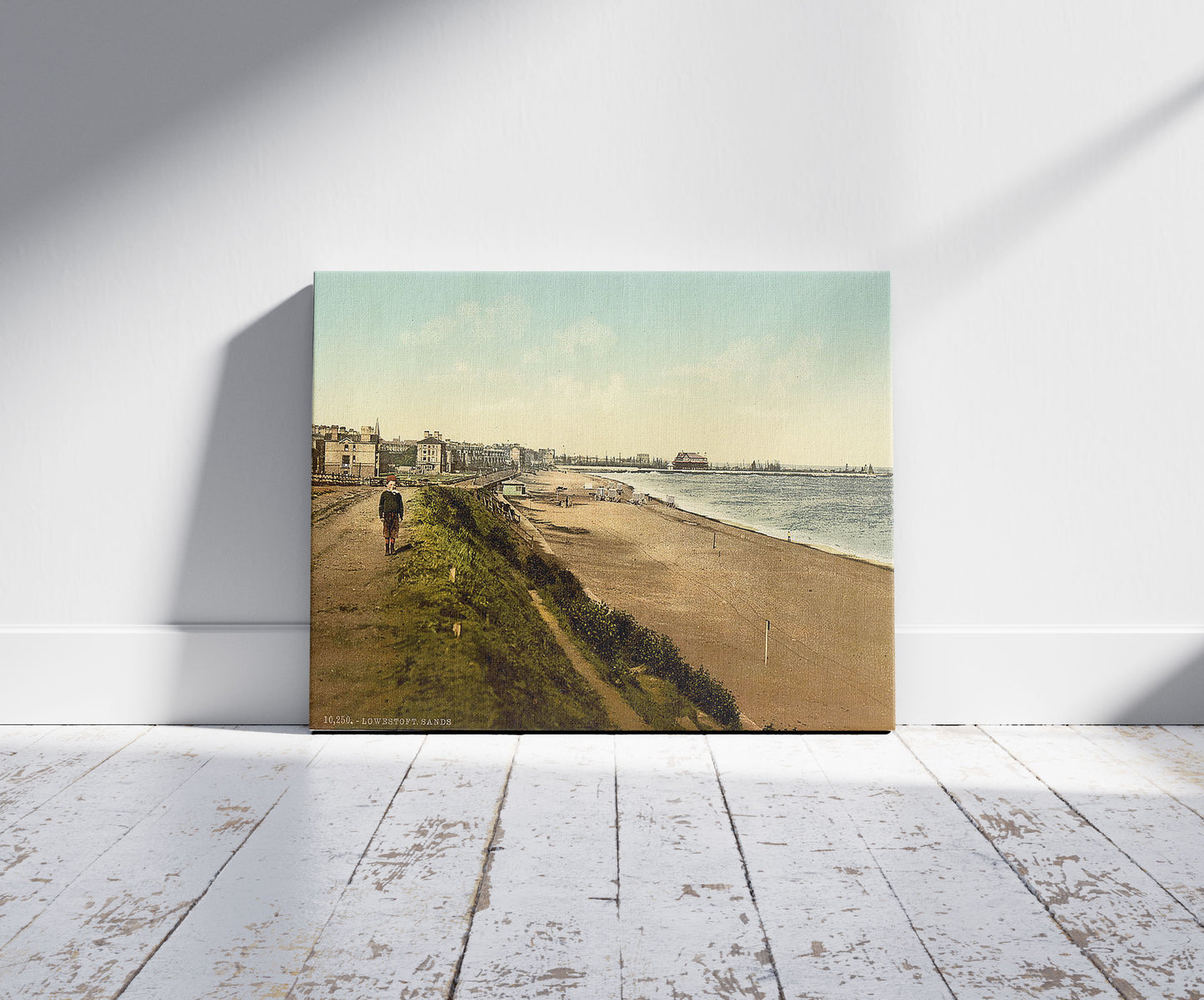 A picture of The sands from Royal Hotel, Lowestoft, England, a mockup of the print leaning against a wall
