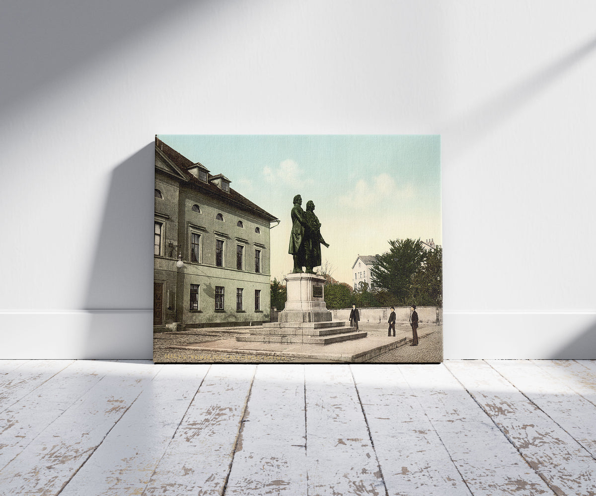 A picture of The Schiller and Goethe Monument, Weimar, Thuringia, Germany, a mockup of the print leaning against a wall