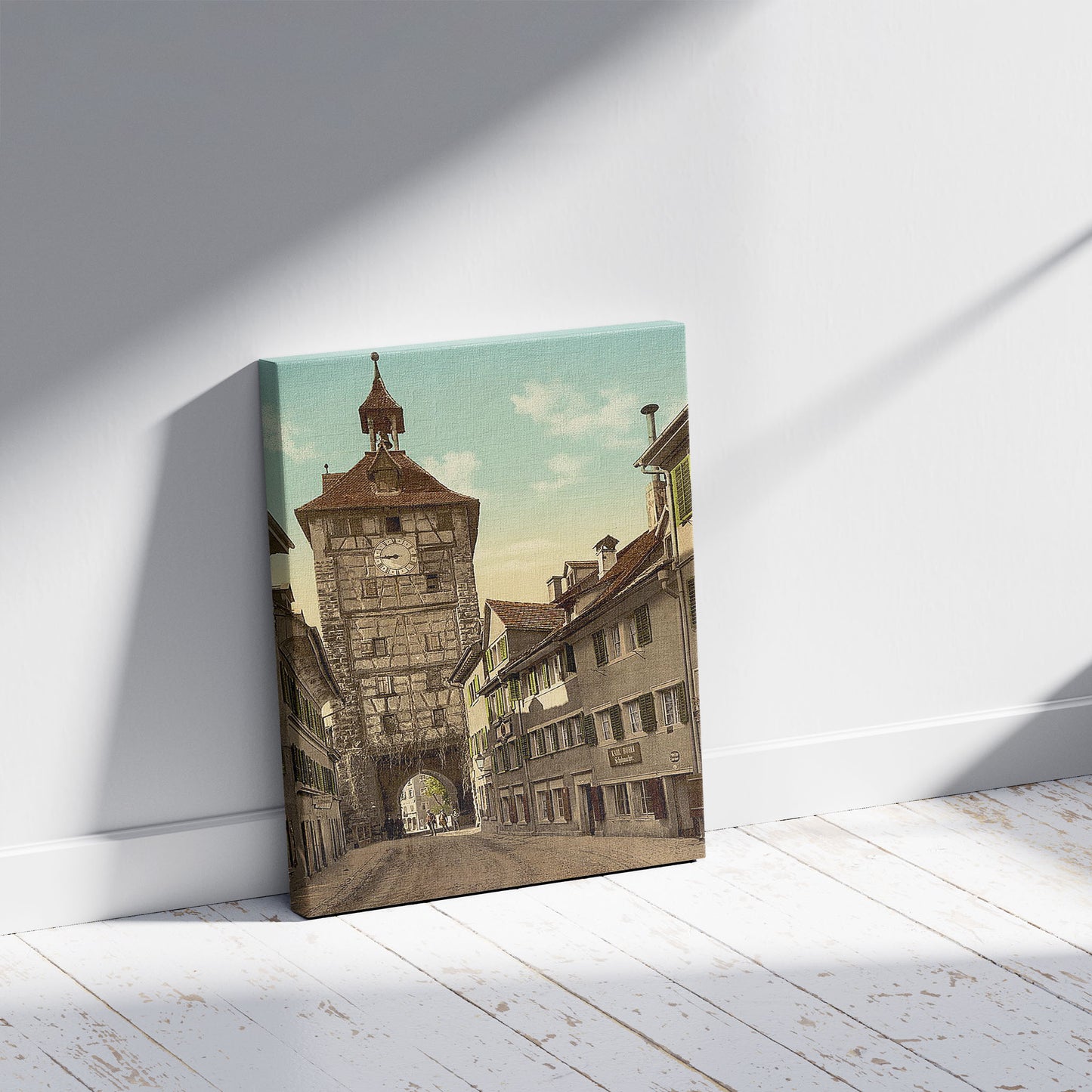 A picture of The Schnetzthor, interior, Constance (i.e. Konstanz), Baden, Germany, a mockup of the print leaning against a wall