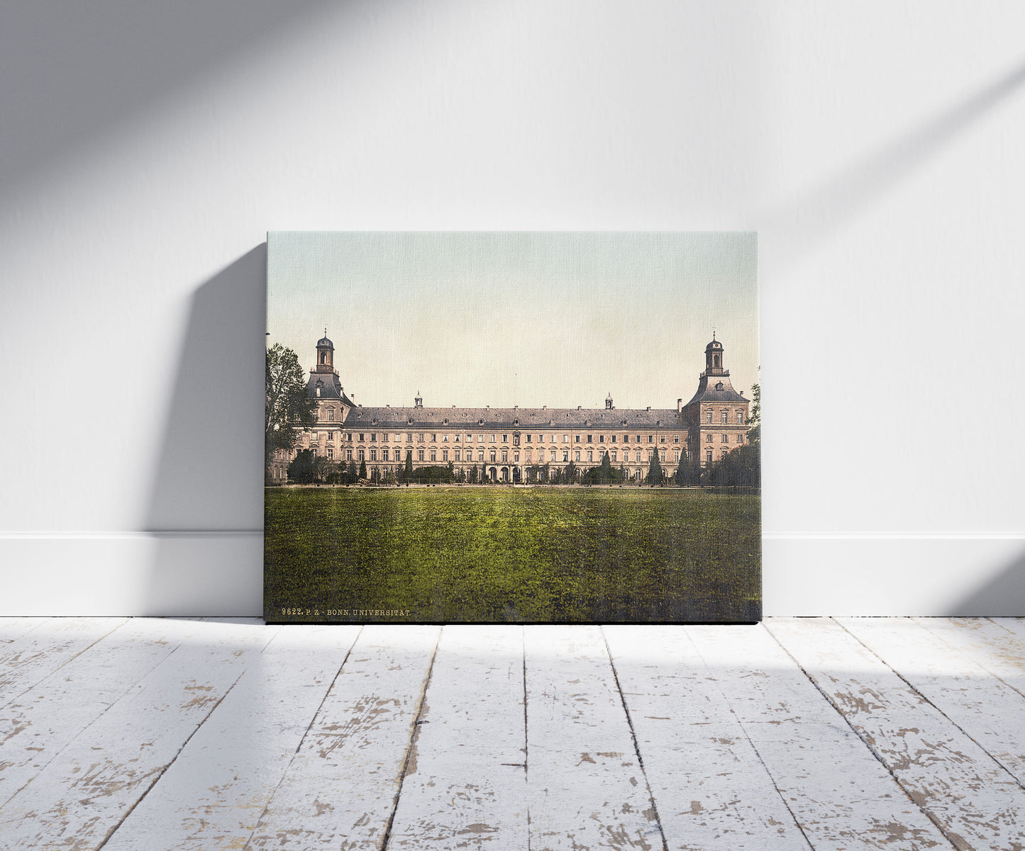 A picture of University, Bonn, the Rhine, Germany, a mockup of the print leaning against a wall