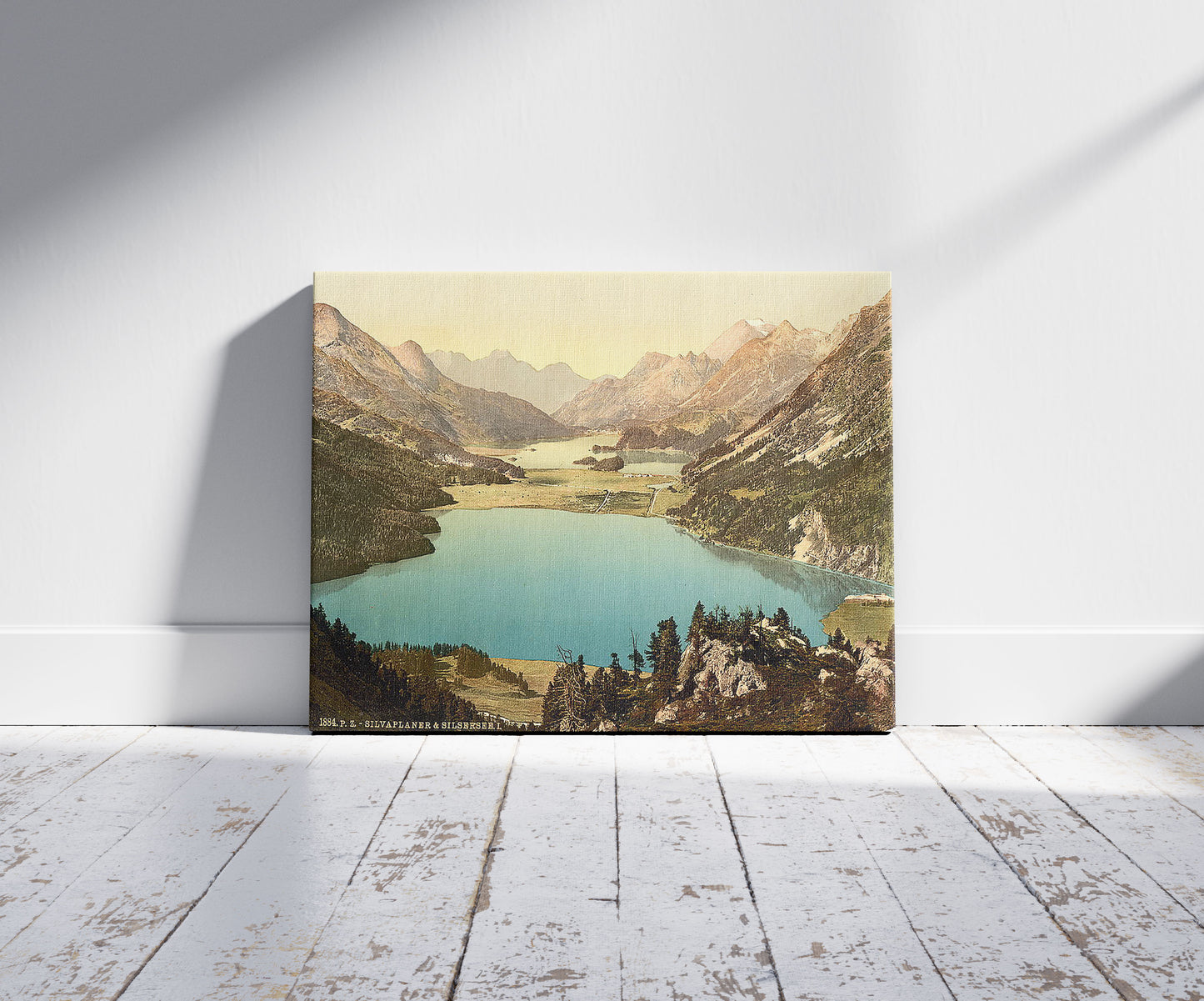 A picture of Upper Engadine, Silvaplana, I., Grisons, Switzerland, a mockup of the print leaning against a wall