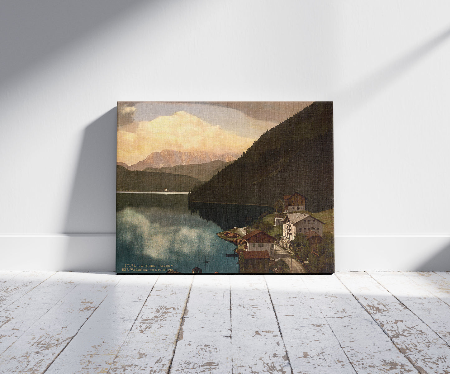 A picture of Walchensee with Urfeld, Upper Bavaria, Germany, a mockup of the print leaning against a wall