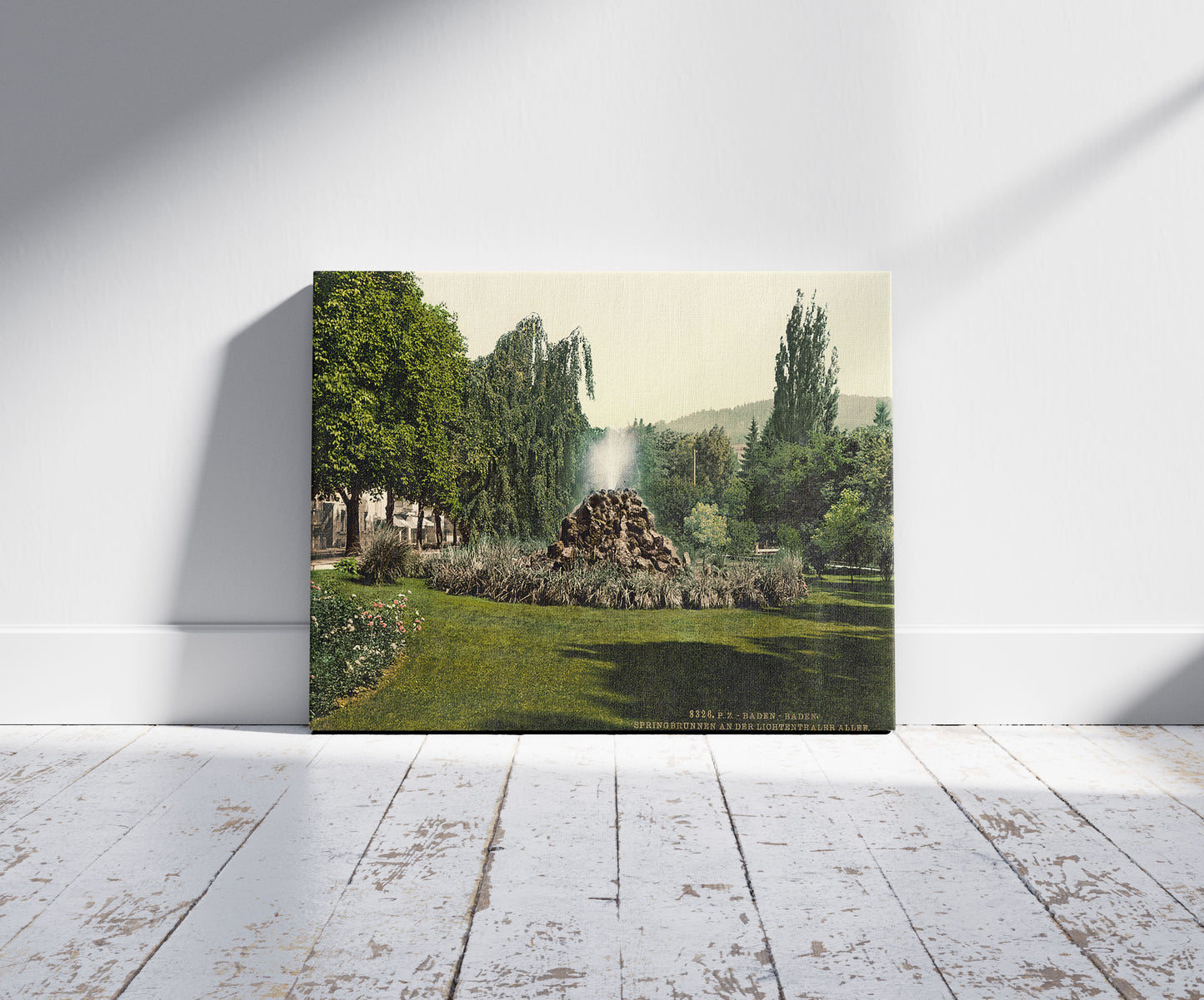 A picture of A Fountain in the Allee de Lichtenthal (i.e. Lichtentaler Allʹee), Baden-Baden, Baden, Germany, a mockup of the print leaning against a wall