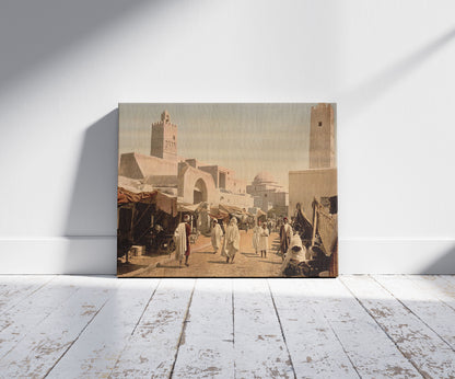 A picture of A mosque in the principal street, Kairwan, Tunisia, a mockup of the print leaning against a wall