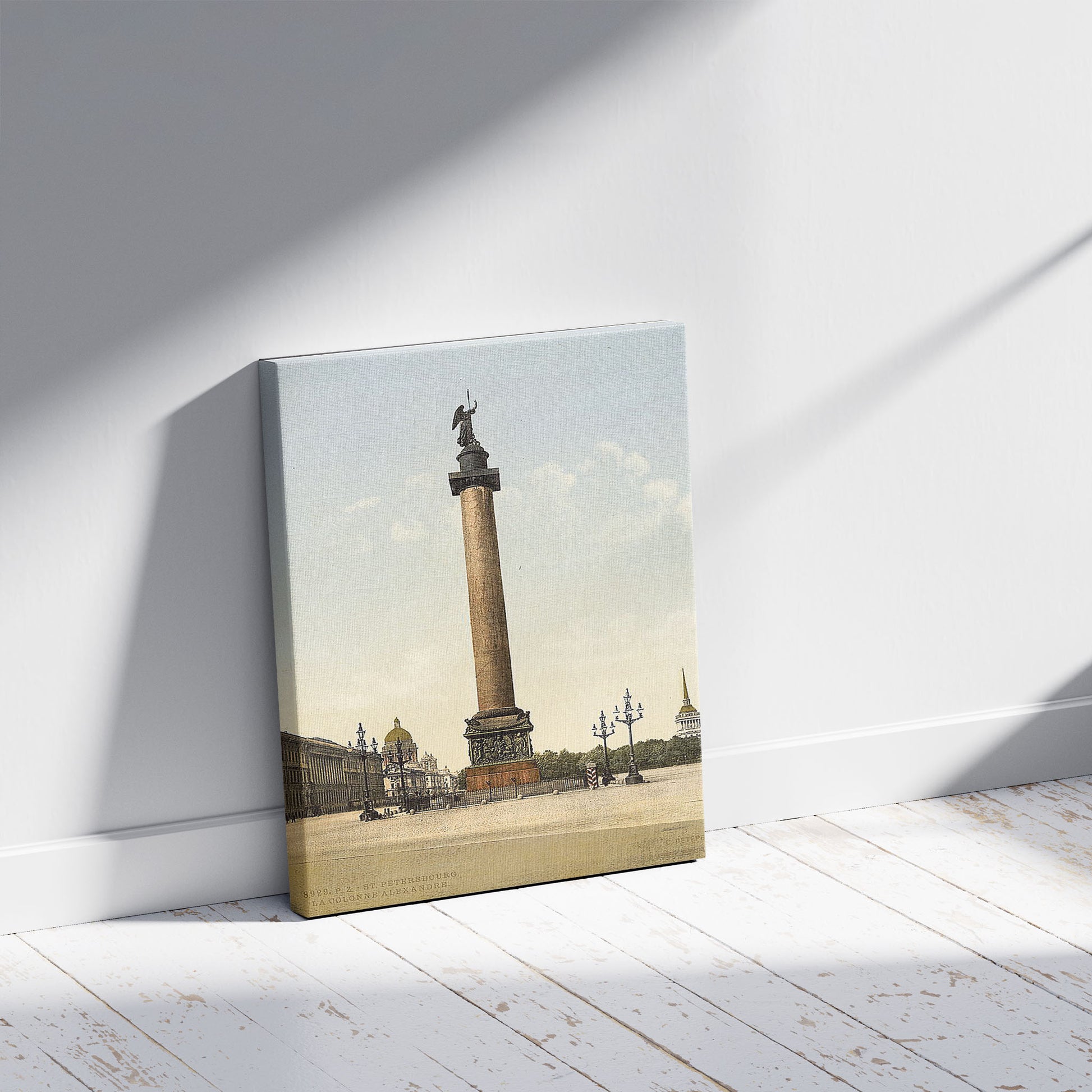 A picture of Alexander's Column, St. Petersburg, Russia, a mockup of the print leaning against a wall