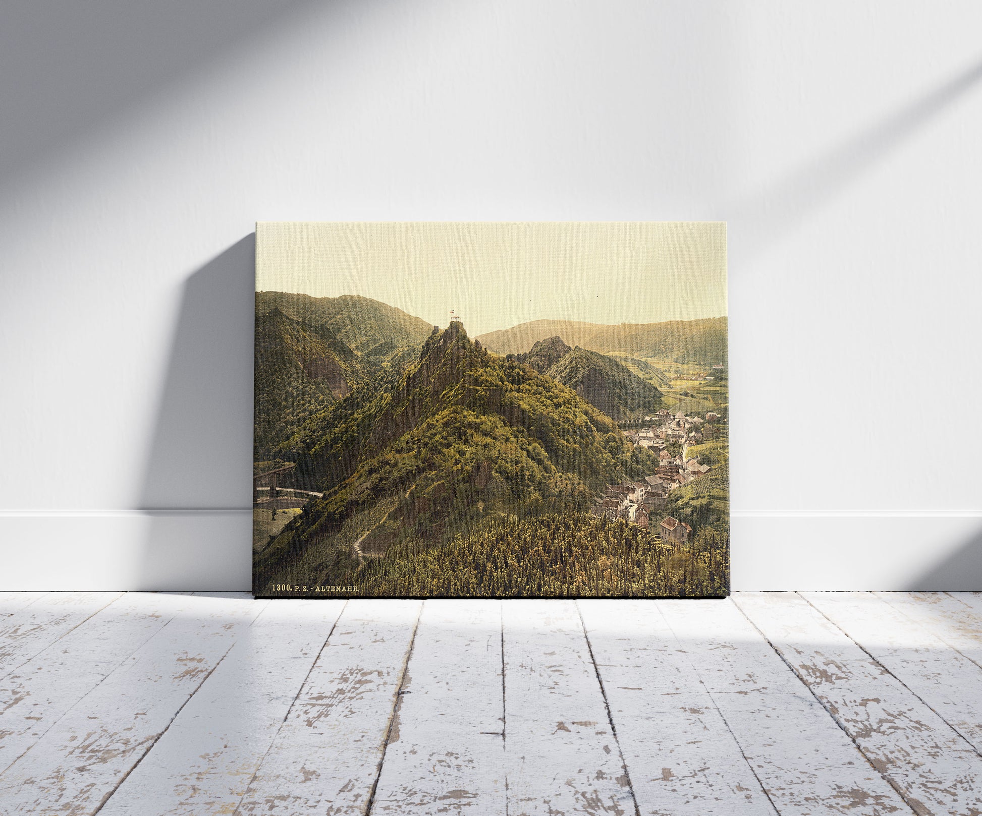 A picture of Altenahr and the White Cross, the Rhine, Germany, a mockup of the print leaning against a wall