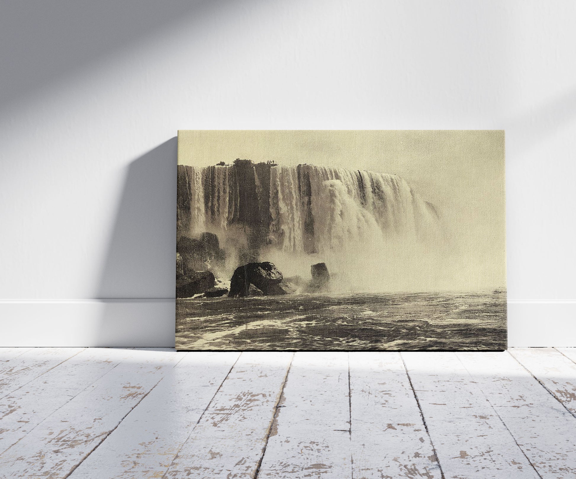 A picture of American Falls, Niagara, a mockup of the print leaning against a wall