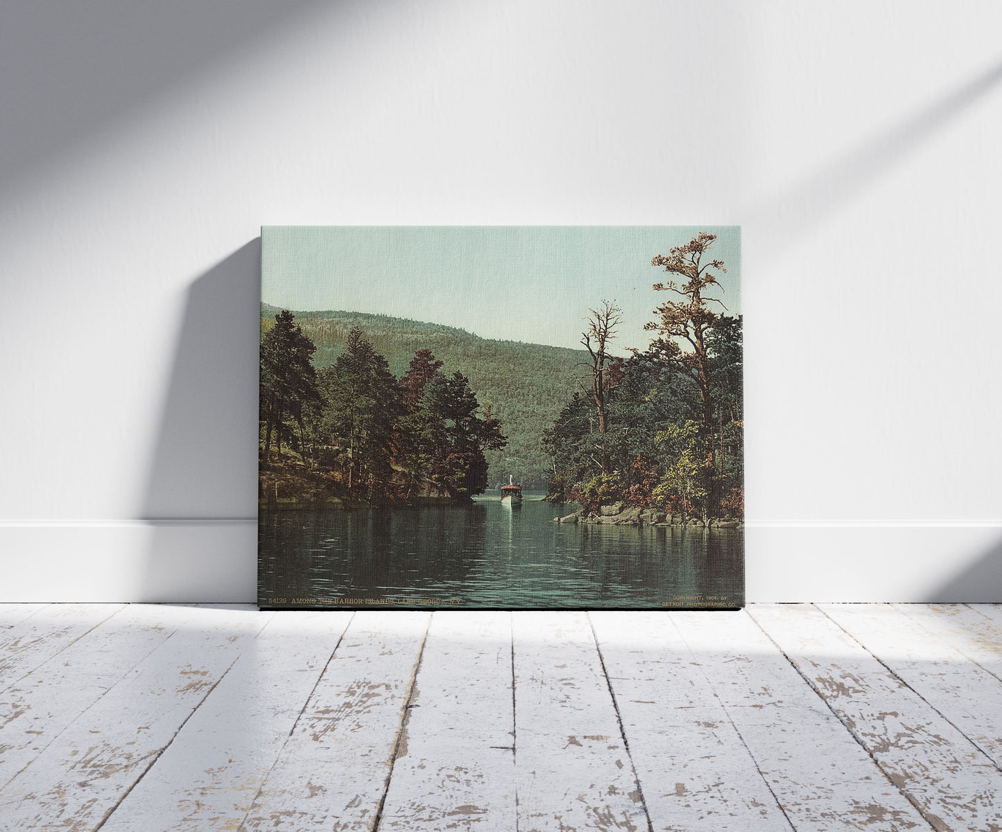 A picture of Among the Harbor Islands, Lake George, N.Y., a mockup of the print leaning against a wall