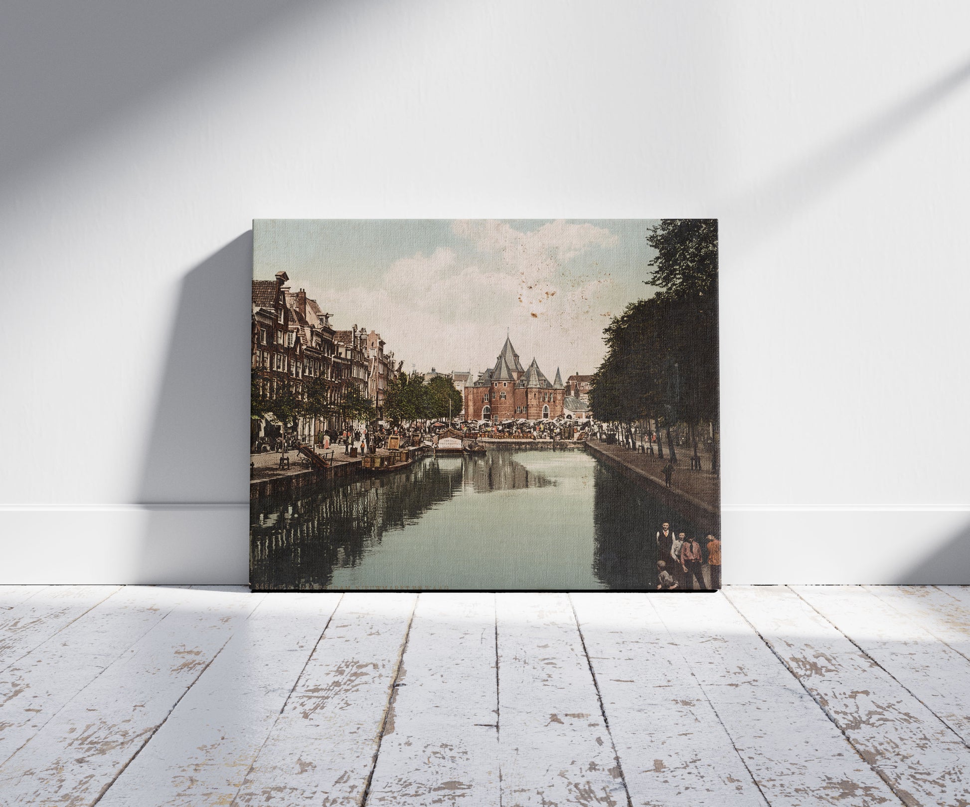 A picture of Amsterdam, Nieuwmarketen waag, a mockup of the print leaning against a wall