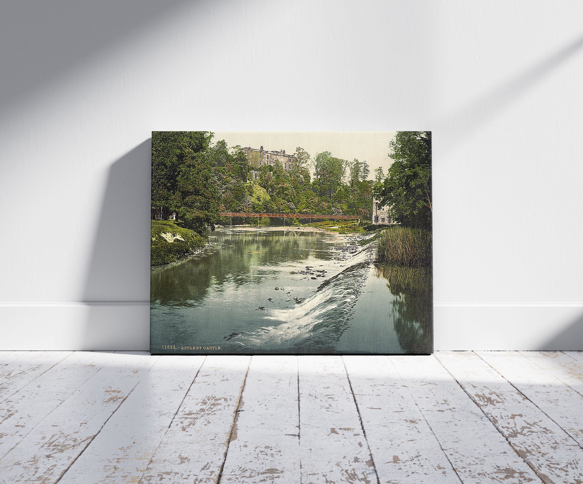 A picture of Appleby Castle, Lake District, England, a mockup of the print leaning against a wall