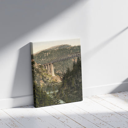 A picture of Arlberg Railway, Trisanna Viaduct and Castle Weisberg, Tyrol, Austro-Hungary, a mockup of the print leaning against a wall