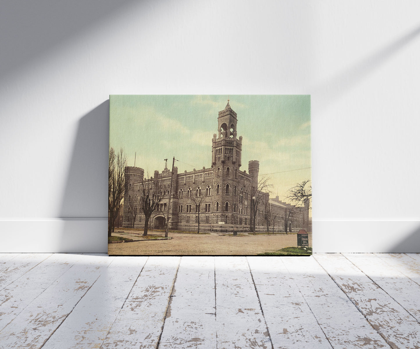 A picture of Armory of the Ohio National Guard, Cleveland, a mockup of the print leaning against a wall