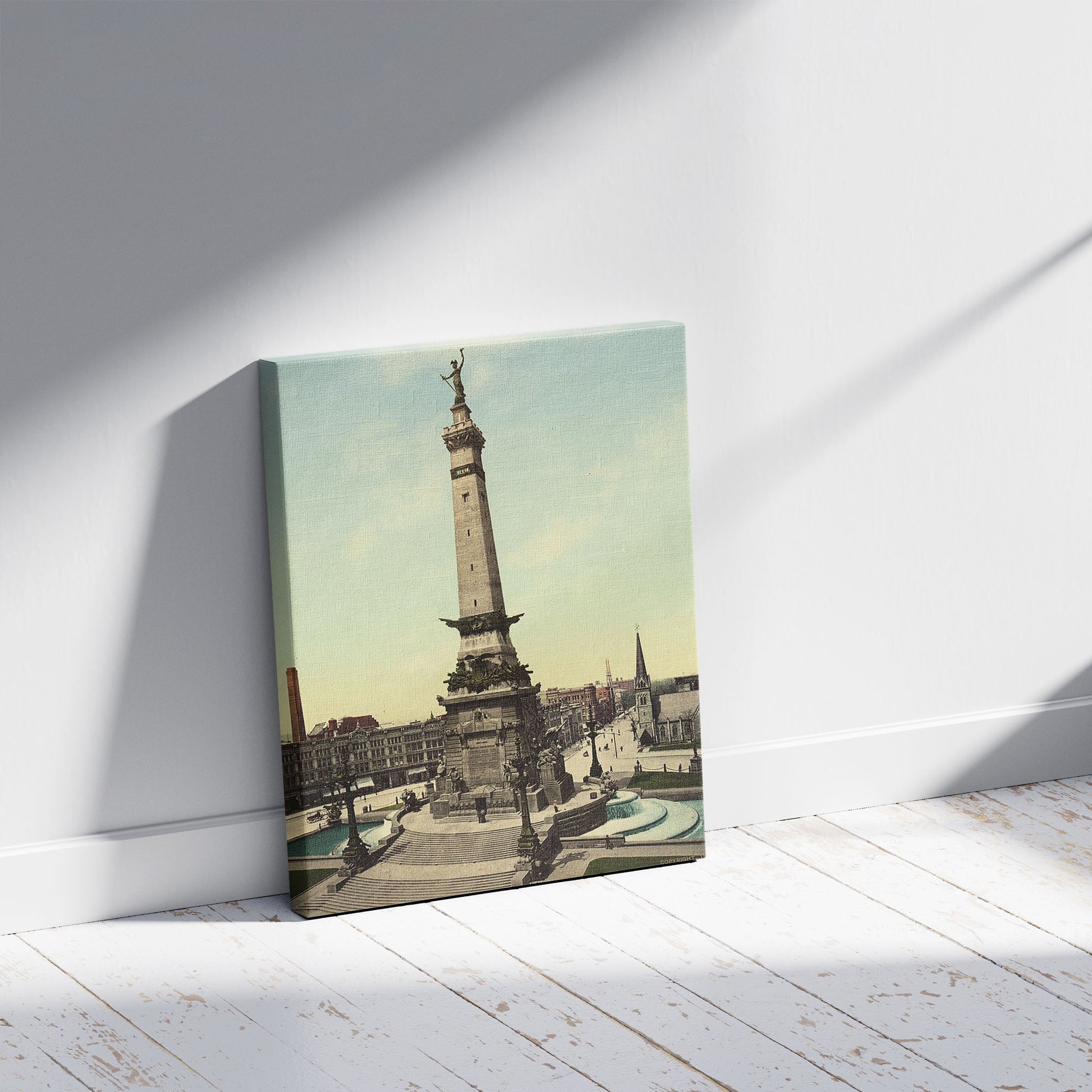 A picture of Army and Navy monument, Indianapolis, Ind., a mockup of the print leaning against a wall