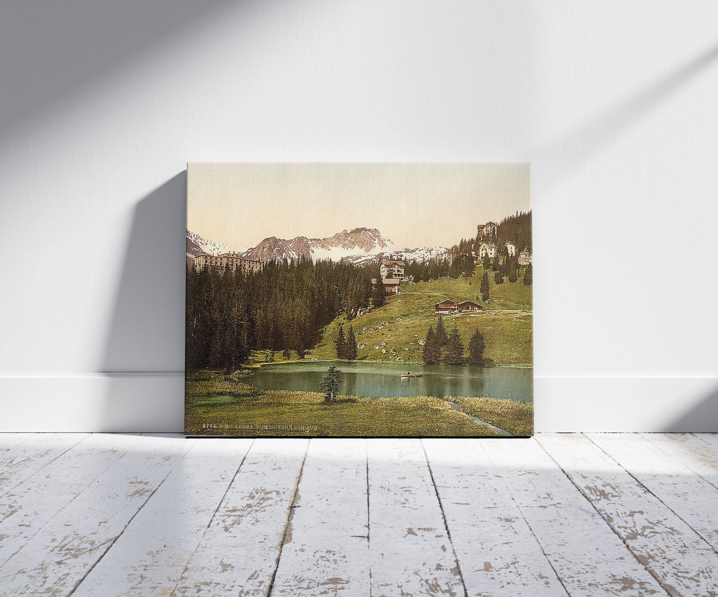 A picture of Arosa, general view, Grisons, Switzerland, a mockup of the print leaning against a wall