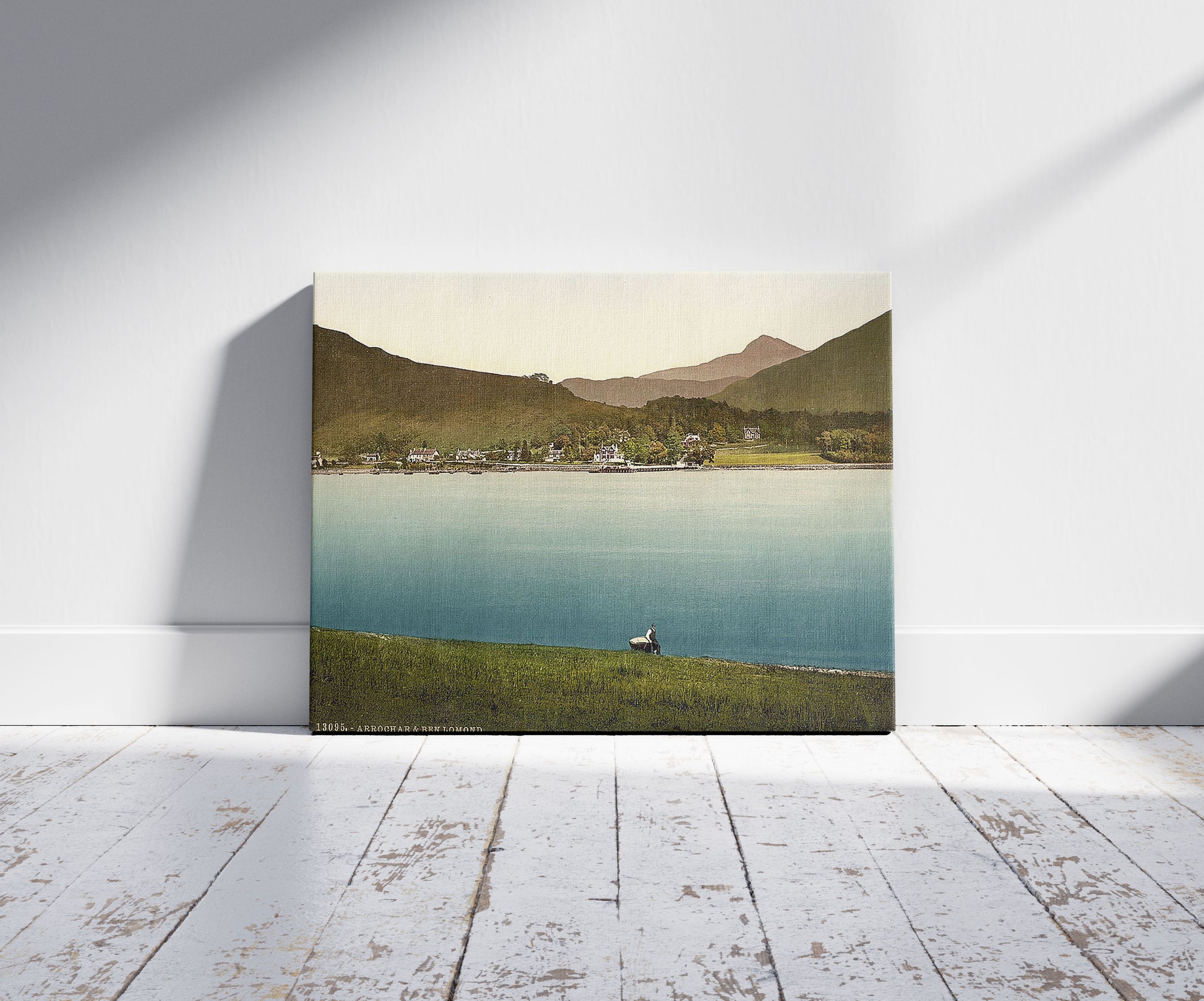 A picture of Arrochar and Ben Lomond, Scotland, a mockup of the print leaning against a wall