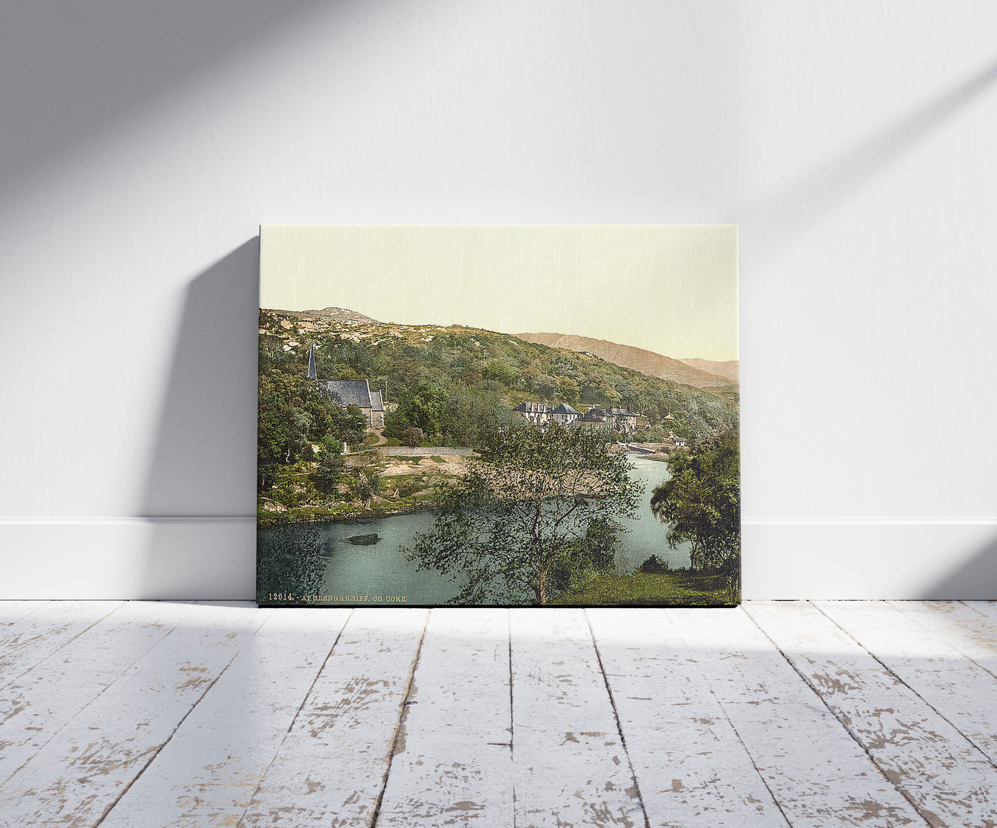 A picture of At Glengariff. County Cork, Ireland, a mockup of the print leaning against a wall