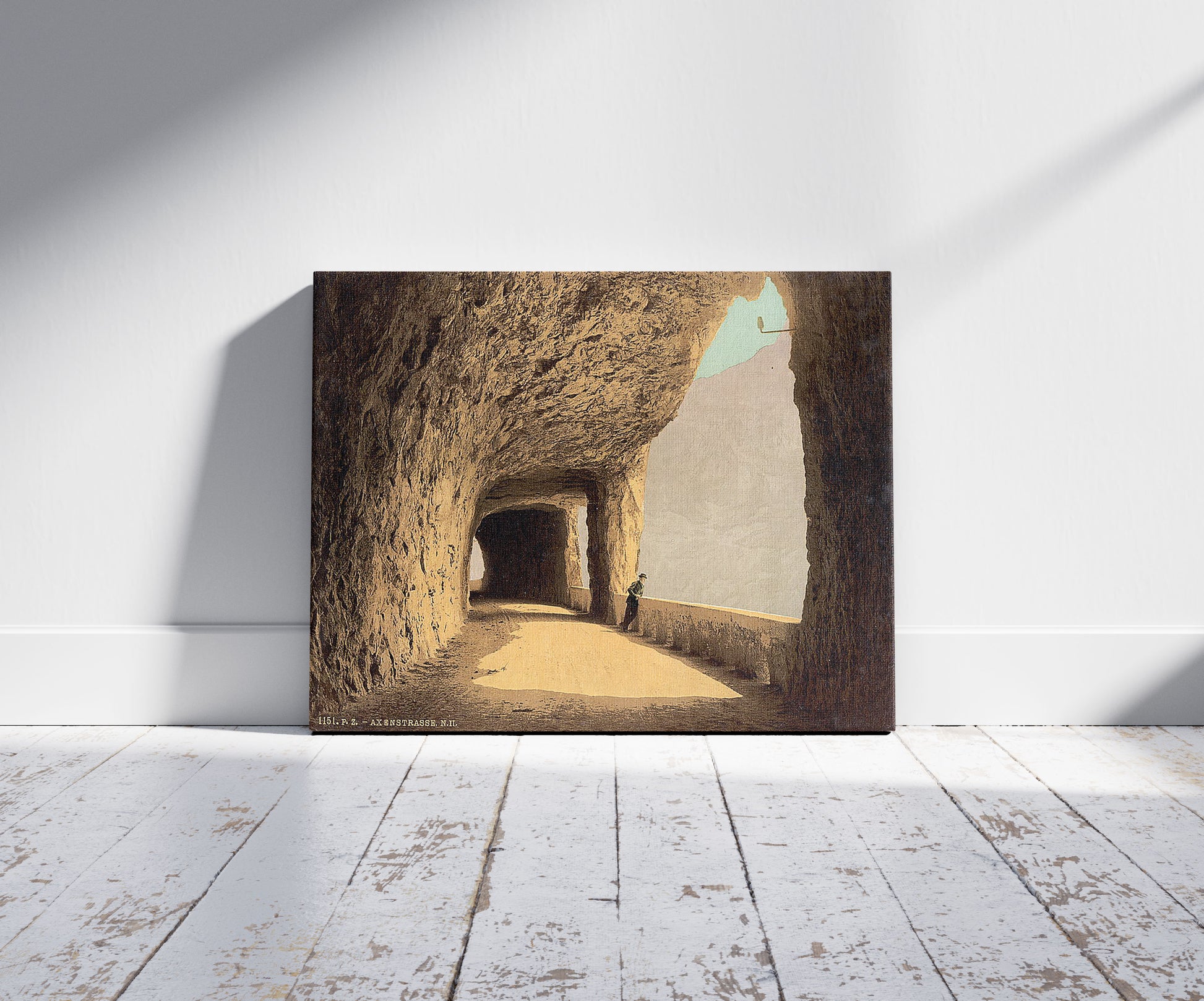 A picture of Axenstrasse, view on the lake, Lake Lucerne, Switzerland, a mockup of the print leaning against a wall
